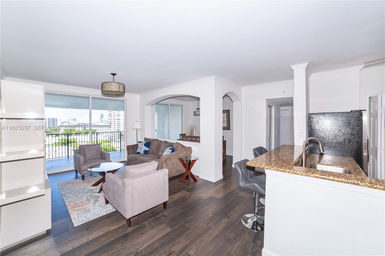MAJOR PRICE REDUCTION – SELLER MOTIVATED! Best-priced 3BR corner PENTHOUSE in the area! This spacious and fully renovated unit offers high ceilings, elegant tile flooring, a luxurious remodeled primary bath, and the upgraded closets, abundant storage throughout while tasteful furnishings also included on the sale, make this unit truly move-in ready. Enjoy panoramic views of the canal, ocean, and Intracoastal from this bright, private residence, along with the unique charm of a fixed pedestrian bridge. Located in a pet friendly Mediterranean-style building with resort-style amenities, 2 assigned parking. Prime location, just steps from the beach, restaurants, shopping, top-rated schools and more. Incredible value—priced for immediate sale! Owner is flexible and open to renting as well. The terms may vary.