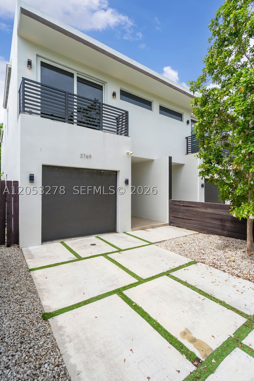 2022 urban villa just steps from Aledo Ave and one block from Ponce de Leon Blvd in the heart of Coral Gables. This contemporary two-story residence offers 3 en-suite bedrooms, 3.5 baths, upstairs laundry and an attached garage. Thoughtful indoor/outdoor living with front and rear balconies plus a private rear patio ideal for al fresco dining and entertaining. Walk or bike to fine dining, boutiques, galleries and neighborhood favorites — an exceptional location and move-in ready. Schedule your private showing today.