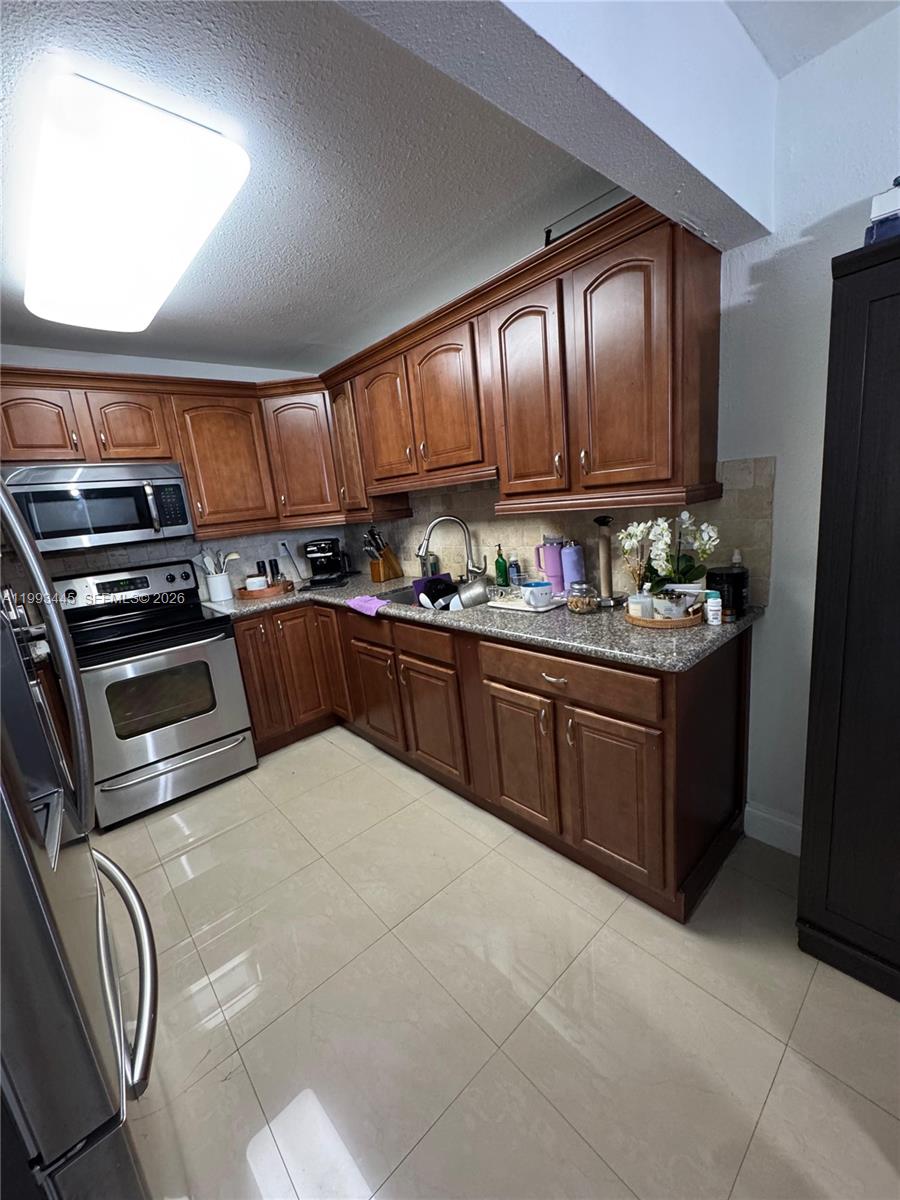 CORAL GATE EAST CONDO - Residential
