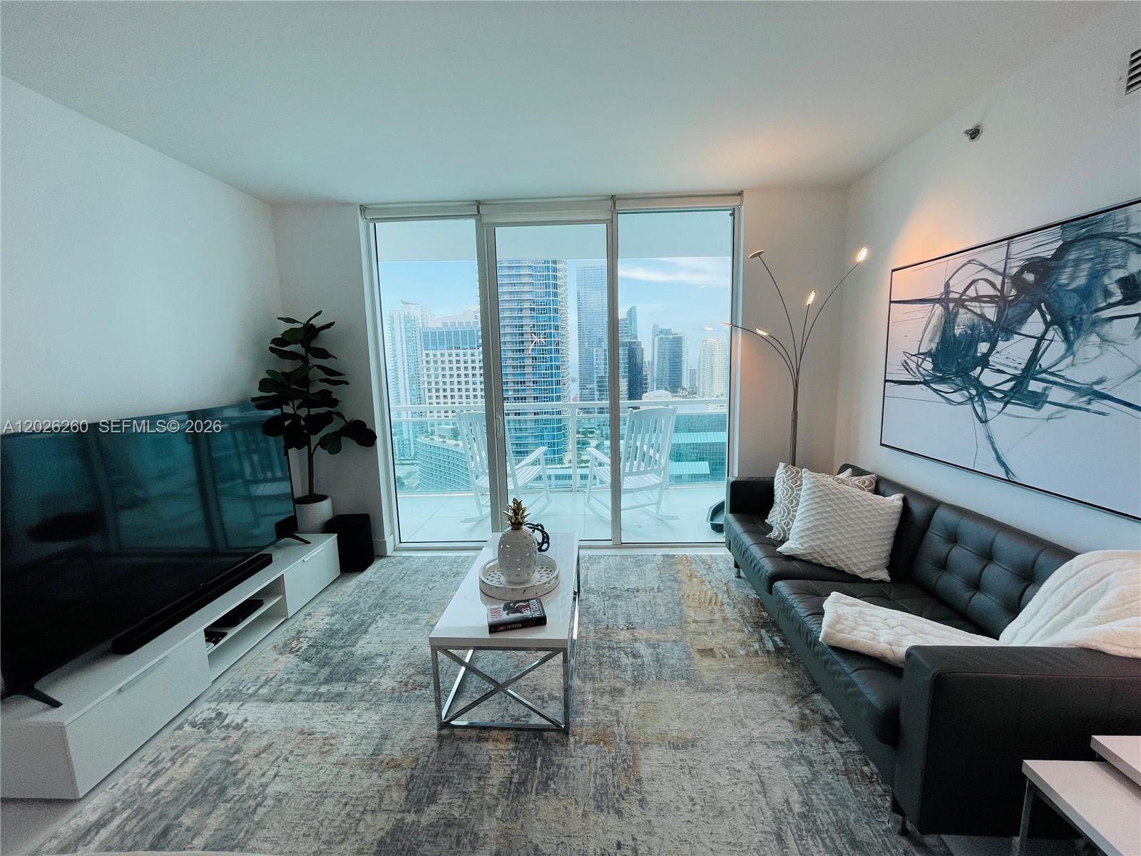 THE PLAZA 851 BRICKELL CO - Residential Lease