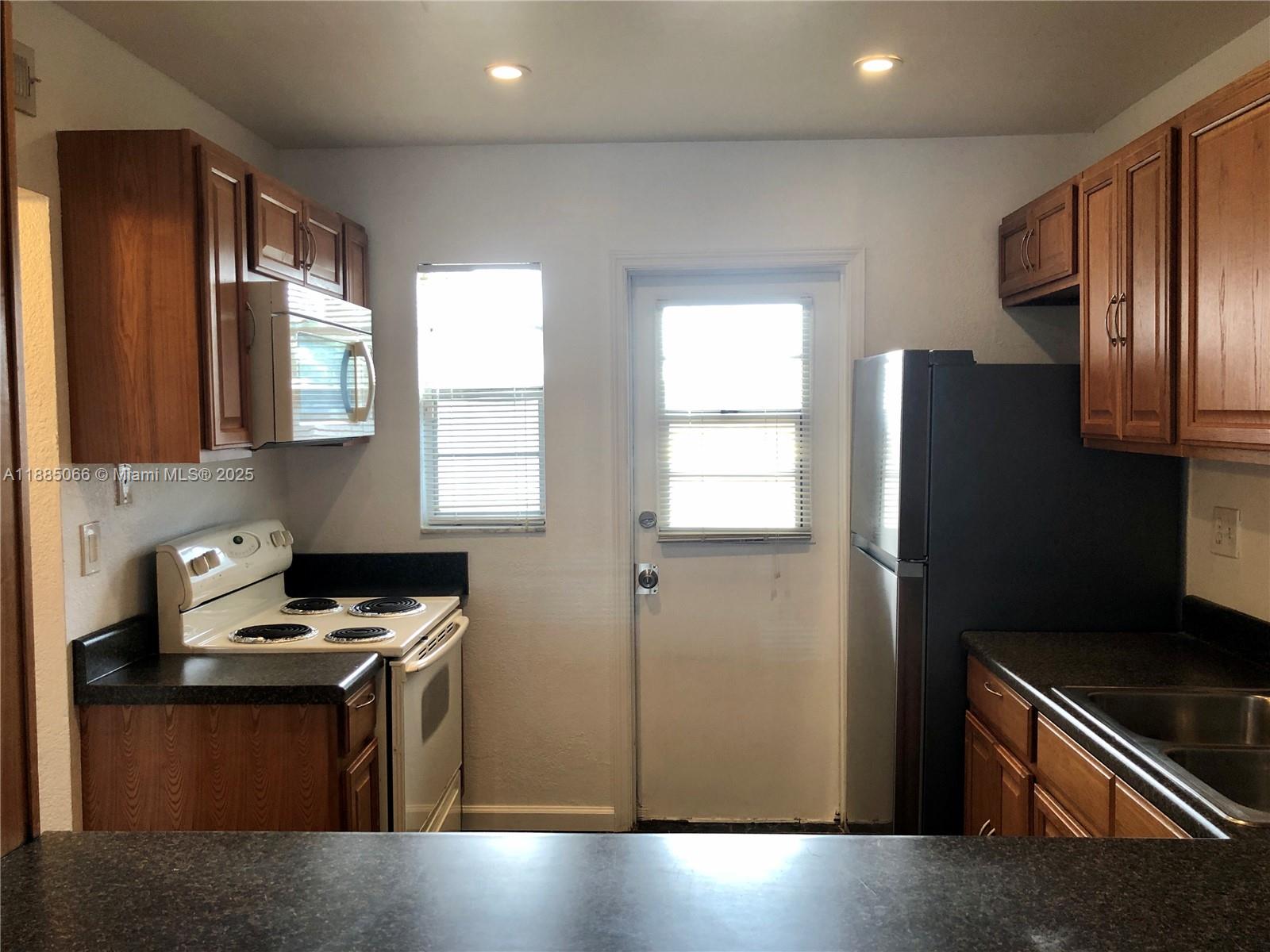 Fantastic opportunity to own a spacious 1 bed, 1.5 bath condo in the highly sought-after Arrowhead. A well-designed layout and is an ideal choice for first-time homebuyers, investors, or students. Enjoy true South Florida living with resort-style amenities including a swimming pool, clubhouse, hot tub, tennis courts, and a BBQ/picnic area. The location is unbeatable! You'll be minutes from NSU, Broward College, FAU. Easy access to major highways like I-595 and the Florida Turnpike. Daily errands and entertainment are a breeze with multiple shopping centers nearby. Don't miss this chance to secure a property in a location poised for growth and convenience! Unit includes storage unit and water is covered by the association.