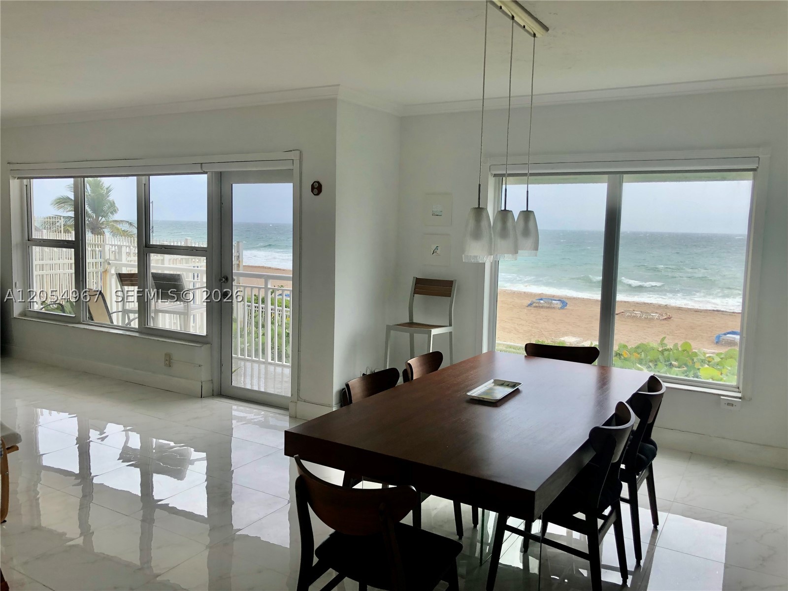 This is your dream beachfront vacation! North East corner, direct view to the ocean enjoying the peaceful sunrise everyday. This unit has spacious open kitchen, 3 bedrooms,3 bathroom,with a convenient in-unit washer and dryer, totally furnished just bring your belongings!!!
 The building has exceptional amenities  a heated pool for year-round enjoyment, fitness center , and beach chairs and umbrellas provided for you, a game room, car washing area. Don’t miss the chance to experience oceanfront living!