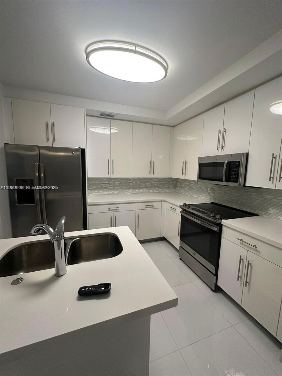 WEITZER AVENTURA PLACE CO - Residential
