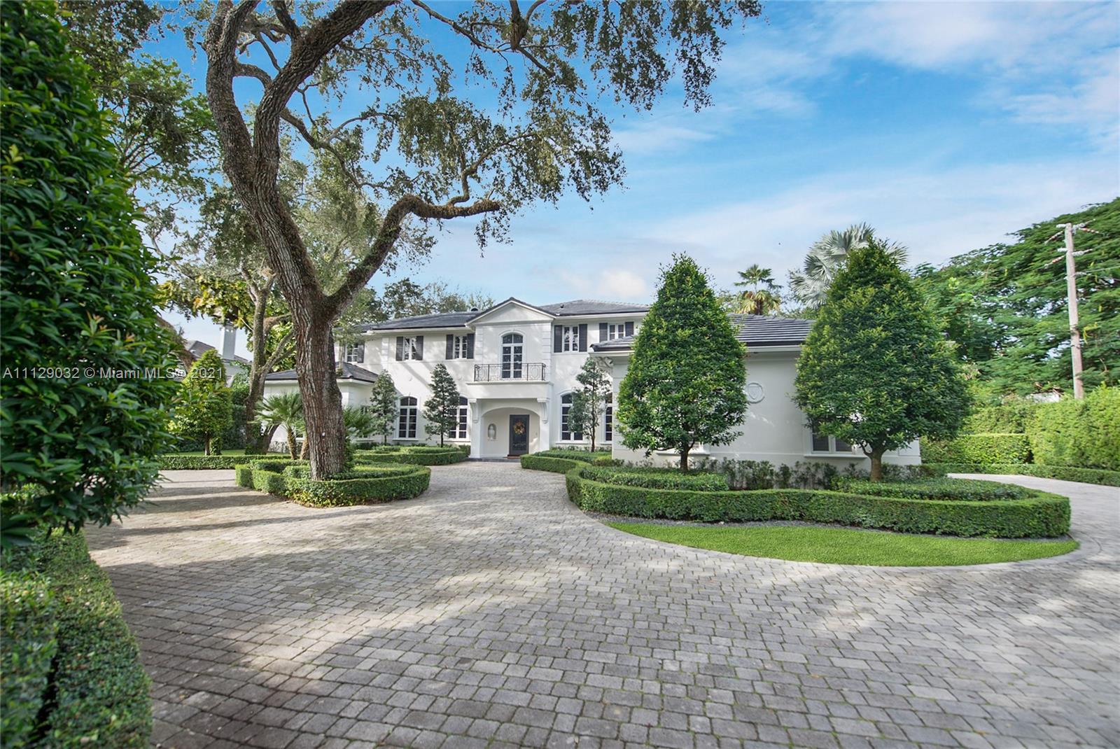 Exquisite details & design coupled with the best location in Miami make this an opportunity of a lifetime! One of only 12 in private, gated Stonegate, this home features oak hardwood flrs, extensive moldings, soaring ceilings & designer finishes. All mesh perfectly w the Palm Beach vibe & unique style–livable but grand perfection. High end finishes like Bosch, Watermark & Dornbracht are found throughout. Upstairs master suite offers a private family rm & office w a spa-like bathrm. Gourmet kitchen, formal living & dining rms, library, fireplaces, full house generator, 3-car gar, new roof–the list is endless. Sitting on ¾ acre w meticulous landscaping, the backyard has a spacious screened lanai, saline pool, built-in bbq, Sonos & even a kid’s playhouse. This home will take your breath away!