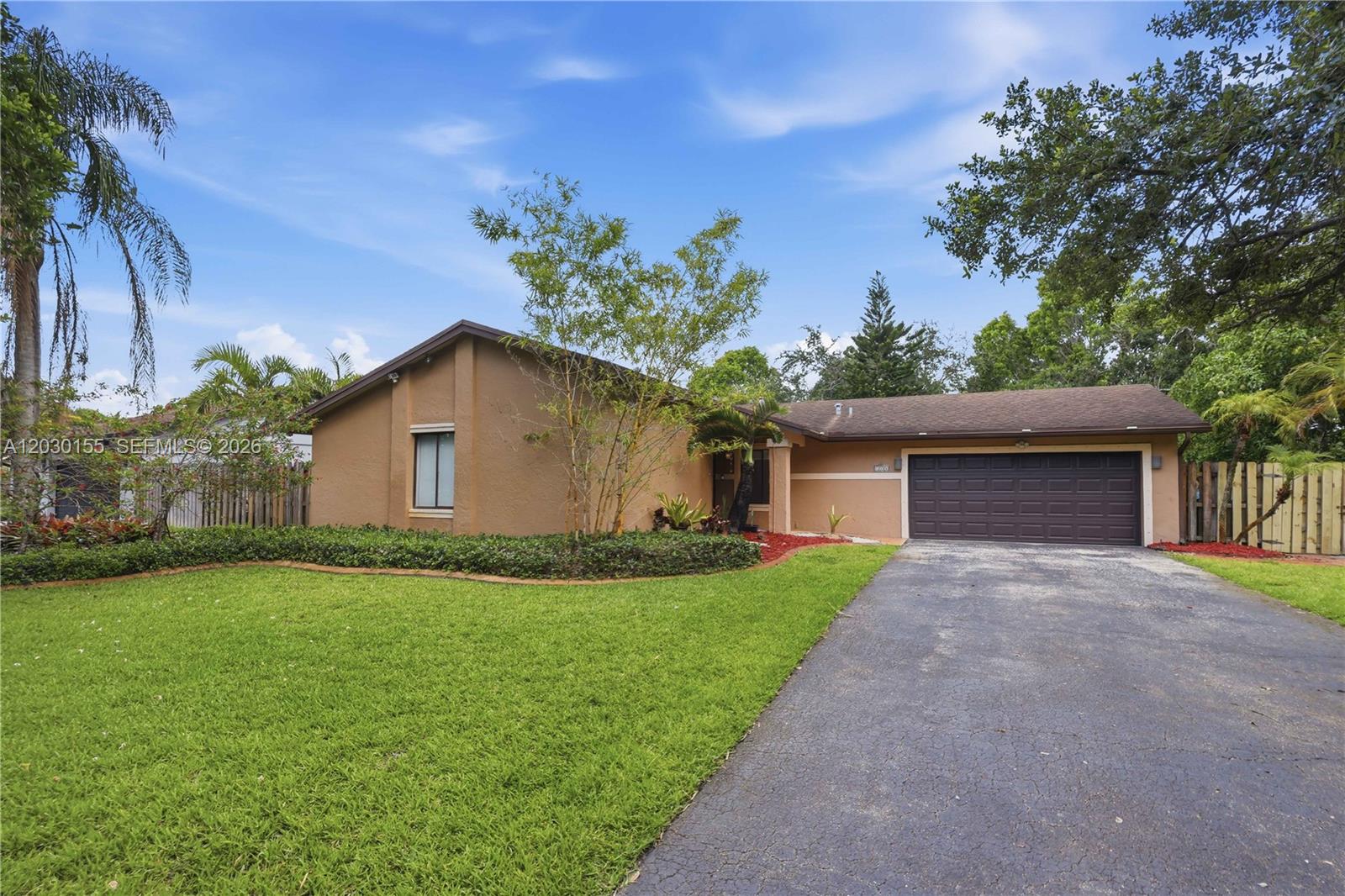 Beautiful home in the desirable Rock Creek community on an oversized lot with a large fenced backyard offering plenty of space for entertaining, pets, play, gardening, or a future pool. Inside, you'll find tile floors throughout, an updated kitchen featuring white cabinetry, granite countertops, and a center island, plus a dedicated laundry room with built-in cabinets for added storage and convenience. Community amenities include a clubhouse, swimming pool, fitness center, tennis courts, parks, and walking paths. Zoned for highly rated schools, this home is conveniently located near shopping, dining, and major commuter routes.