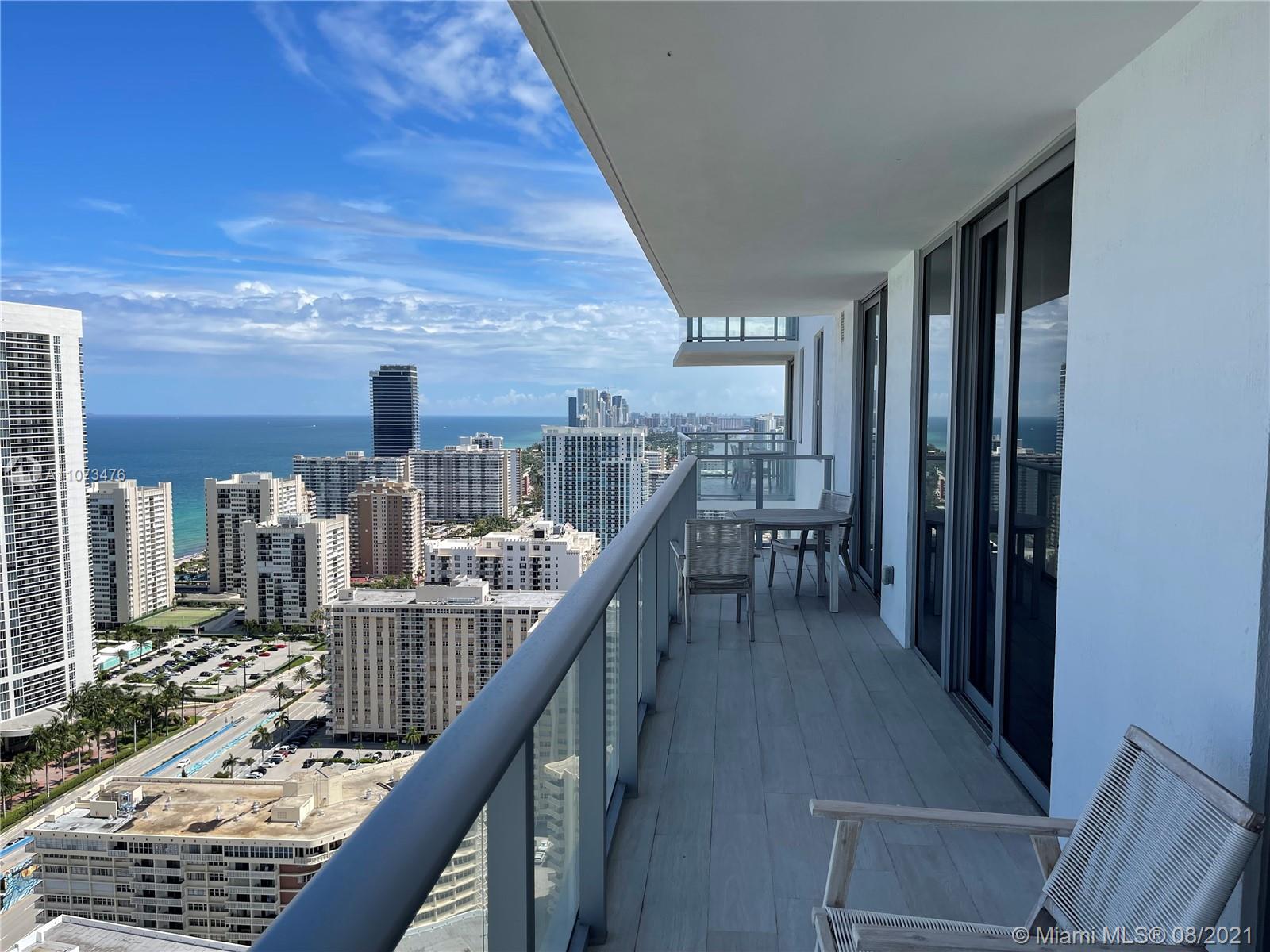 Live or invest in this 2 bed 2 bath unit in a brand new luxury high-rise. Unit comes elegantly fully furnished, turn key with a large terrace that over looks breathtaking direct water views to the ocean & beyond. Five star resort-style amenities with full service concierge service, access to a oceanfront private beach club and ocean access, three heated oversized pools, state of art gym, rooftop lounge and common area with BBQ, tennis court, racquetball, high speed internet in all public areas, 24 hrs. security, free valet parking. Maintenance includes electricity, cable, internet & water. The perfect vacation home and/or your income producing property. NO RENTAL RESTRICTIONS!!! Ideal for investors since building allows daily rentals 365 days per year. Short term rentals & Airbnb approved