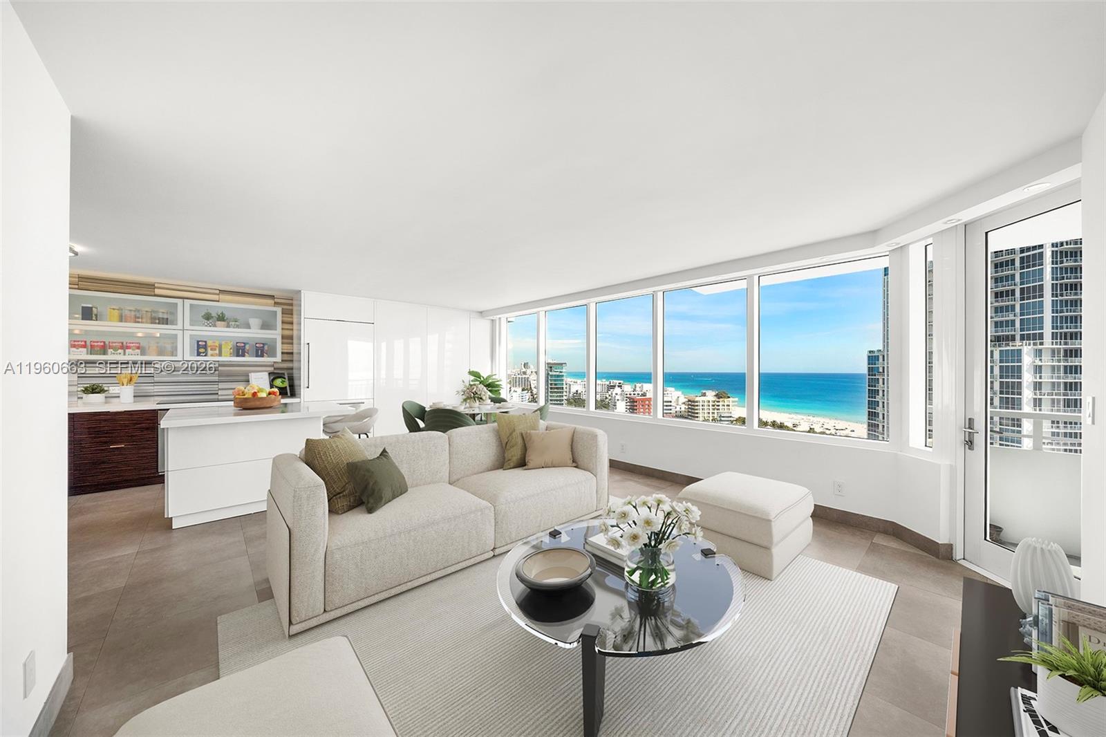2 bedroom 2 full bath beautifully renovated unit offers modern comfort and smart design throughout. High floor unit with expansive ocean views and bright lights of South Beach. Floor plan has been redesigned to maximize expanded living areas and ocean views. Fully updated with impact windows with electric shades in all rooms. The home has been thoughtfully redesigned for open-concept living, creating a bright and spacious feel ideal for everyday living and entertaining. Two hidden Murphy beds are seamlessly integrated into the design, providing comfortable accommodations for guests without sacrificing style or space. Every detail has been carefully considered, making this unit truly move-in ready. Walking distance to beach, fine dining and south pointe park. Brand new common areas completed and assessments paid in full.