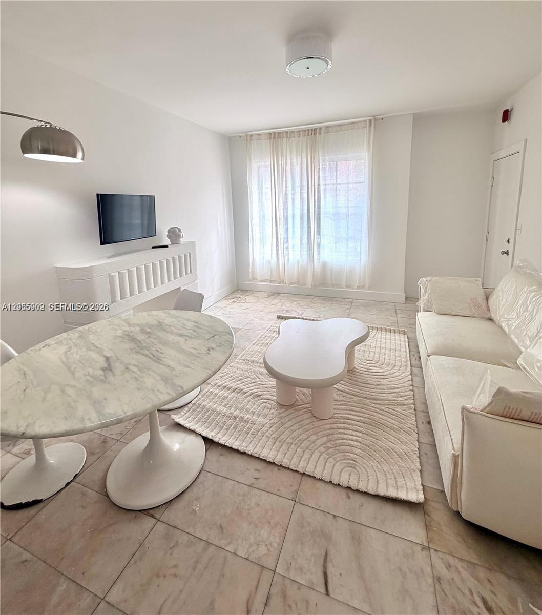 FIRST ON 8TH CONDO - Residential