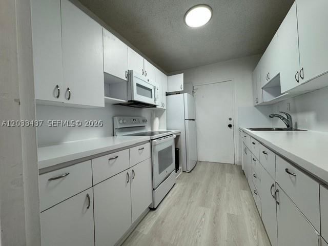 THE CARRIAGE HOUSE CONDO - Residential