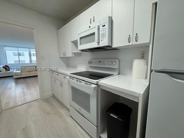 THE CARRIAGE HOUSE CONDO - Residential