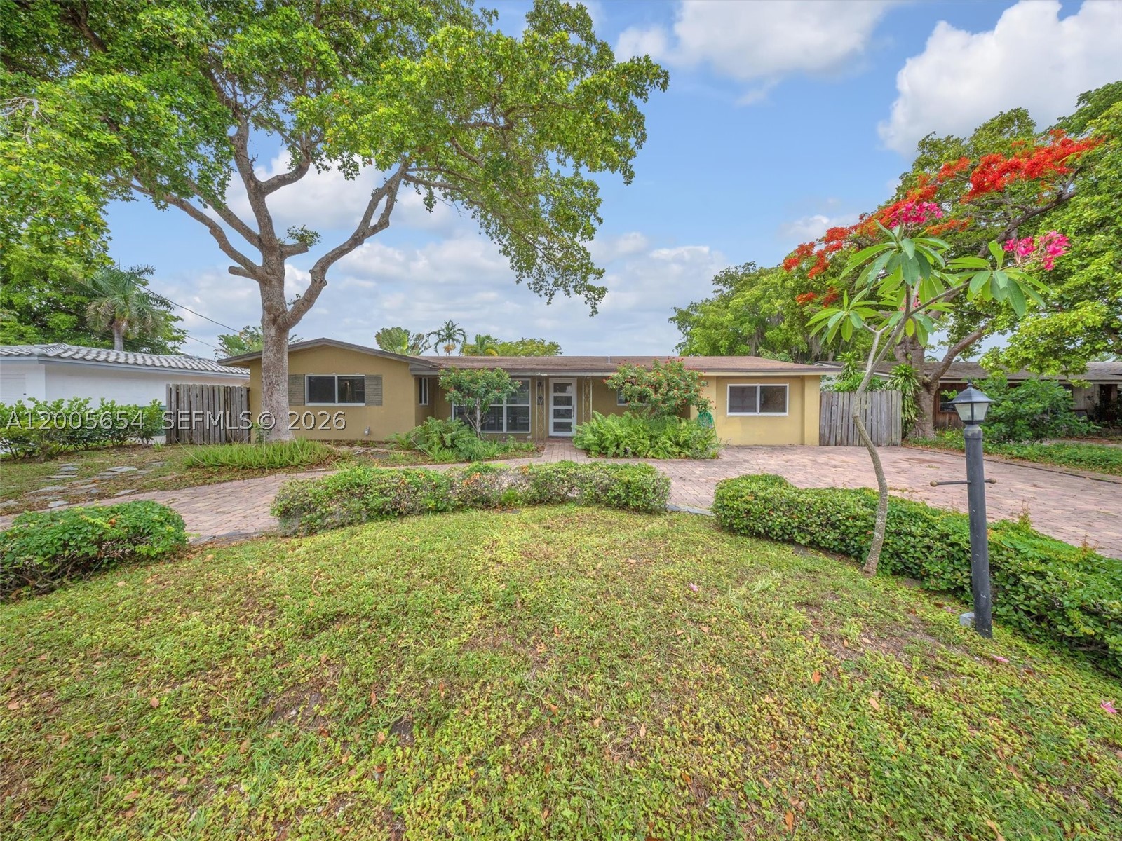 Large and Updated canal front pool home with dock on oversized lot !! Kitchen was recently remodeled and has original hardwood floors through out ! AC ,Tankless water heater and Impact windows less than 3 years old .The Pool was just resealed 2026 and turf grass installed 2022. ** cast iron pipes were completely replaced and a huge savings for any buyer** Home is on a large oversized lot with plenty of options for expansion / addition / Mother in law suite - property is on ocean access canal with 20 foot dockage **with fixed bridges ** - bring your small boat ,kayak or paddle board . Community is in sought after Coral Heights and short bike ride to Lauderdale by the sea and blocks to Las olas and downtown fort Lauderdale .