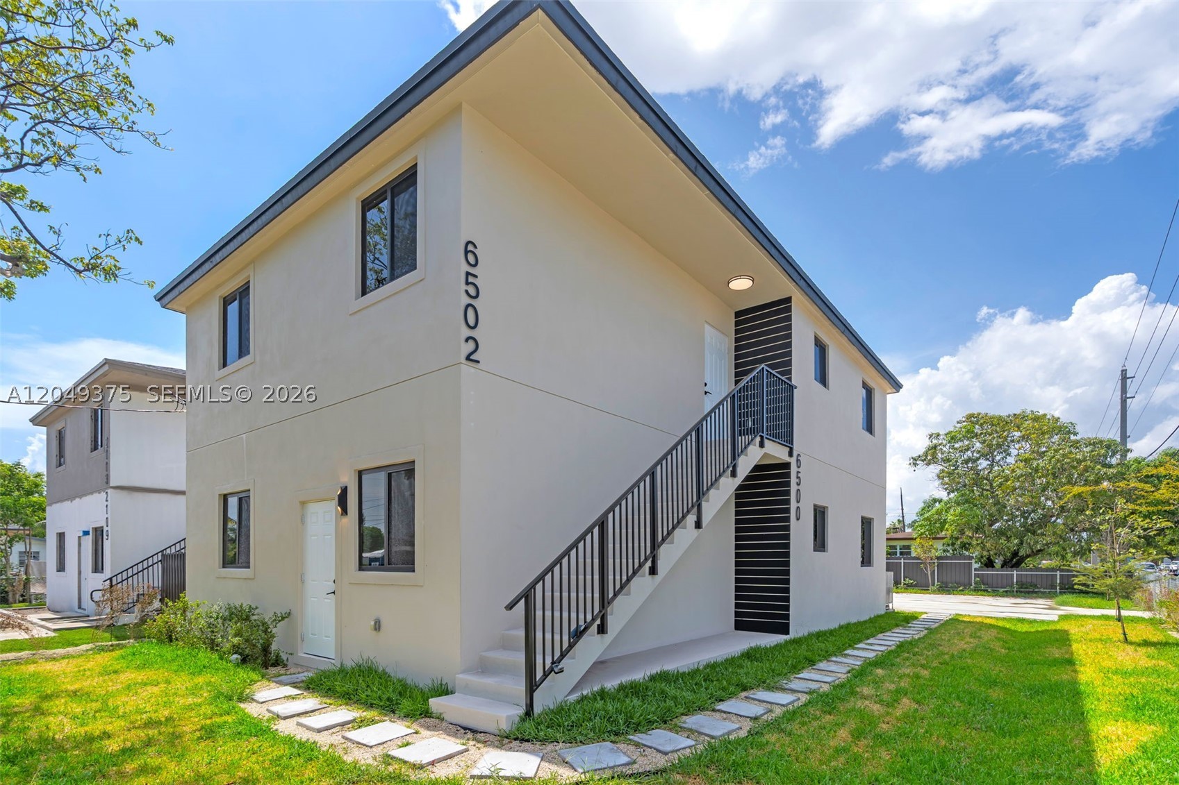 Brand-new 3-bedroom, 2-bath rental featuring an open-concept layout, modern kitchen with quartz countertops, stainless steel appliances, spacious island, impact windows and doors, porcelain tile floors, and in-unit washer & dryer. Conveniently located near major highways, shopping, dining, Miami International Airport, and Downtown Miami. Move-in ready!