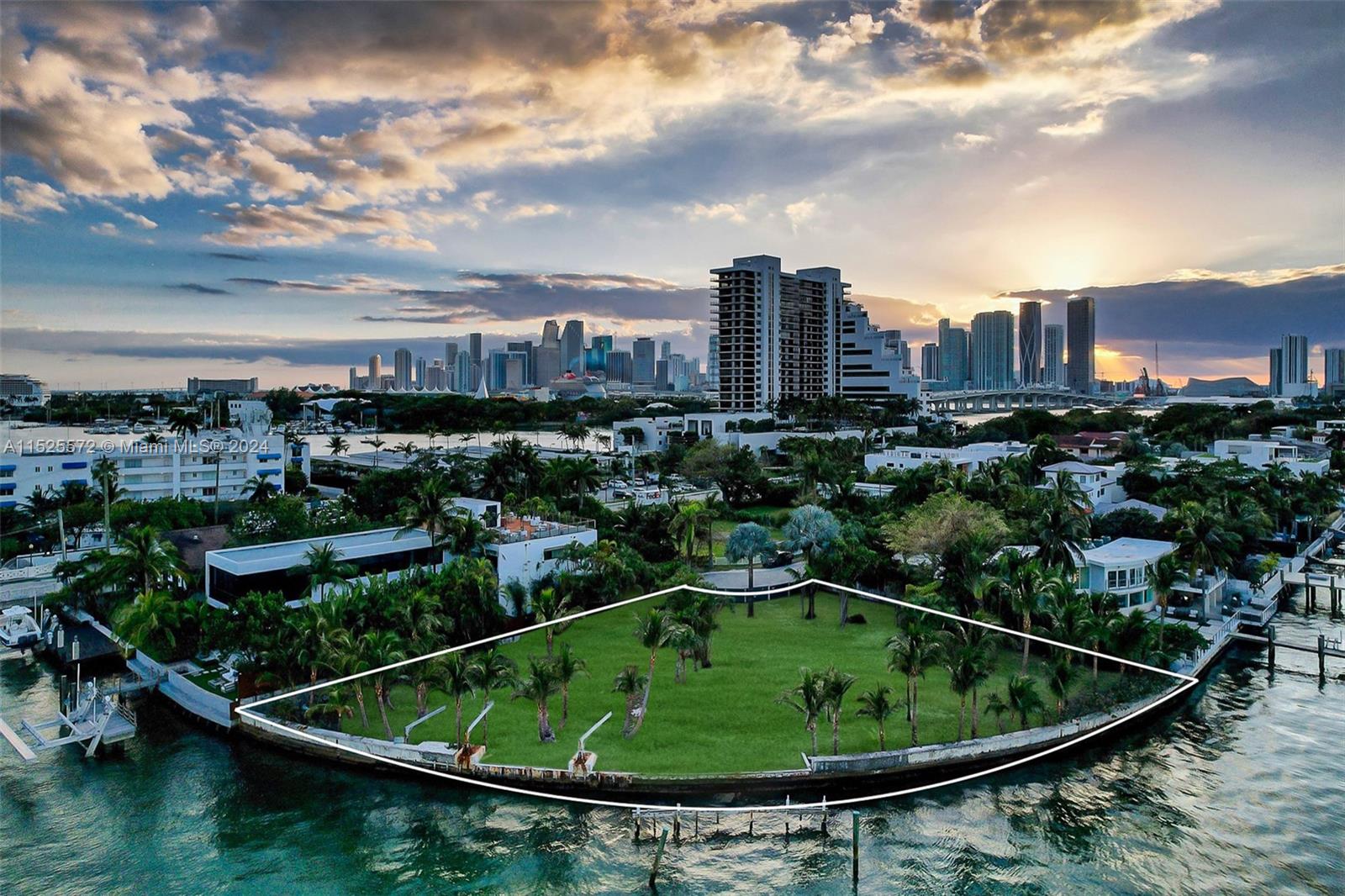 This exceptional 23,640 SF lot on the Venetian Islands is a true masterpiece, seamlessly blending luxury with tranquillity. This prime lot has plans + permits FULLY APPROVED by Dufner Heighes a prestigious architectural firm out of New York. It presents a prime opportunity to build this dream waterfront oasis which has approximately 17,000 SF under A/C, over 26,000 Total SF, with a full rooftop terrace and understory car gallery. The property is surrounded by green natural scenery with a breathtaking view over Biscayne Bay. This property is just minutes away from Miami's most coveted destinations. Situated in an exclusive waterfront location on a cul de sac, the property provides unobstructed views throughout it's over 270 feet of water frontage.
