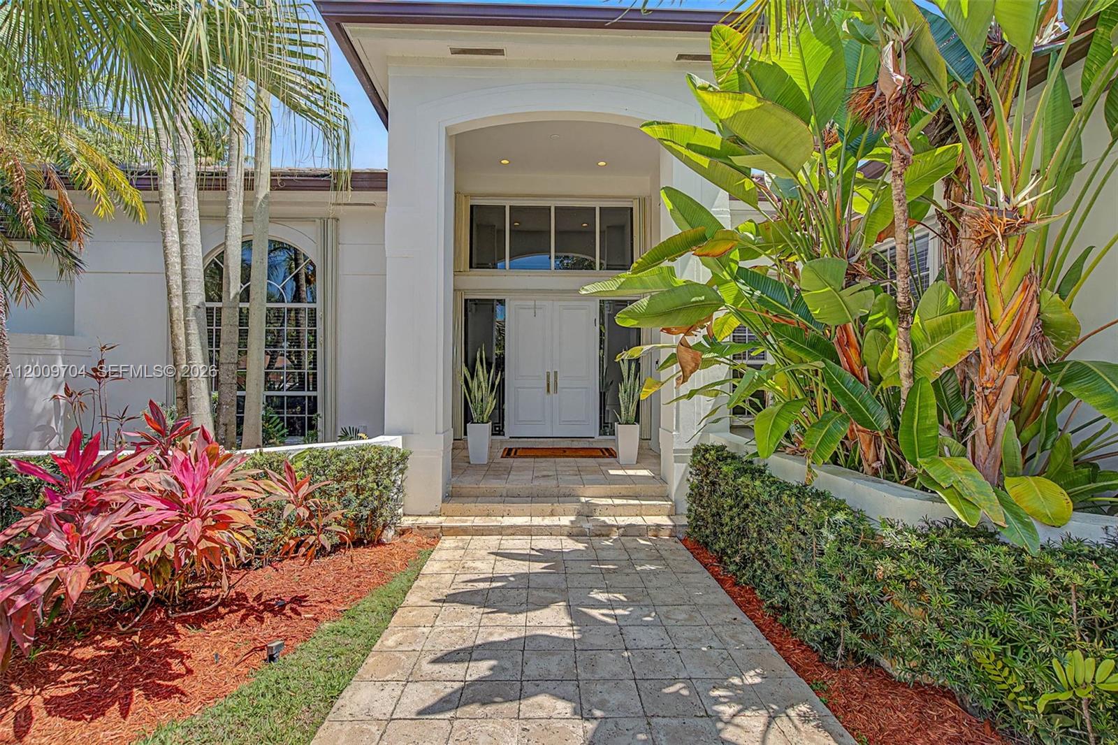 Sophistication meets functionality w/ this spectacular 5 bdrm plus office, 5 bath NE Palmetto Bay home,designed for entertaining, and located in the prestigious gated community of Old Cutler Grove South.  Distinguished formal living rm w/ keystone fireplace, wet bar, soaring ceilings & gorgeous natural light. Formal dining rm. Gourmet eat-in kitchen has bar seating & breakfast nook , opens to spacious family rm. Split floorplan. Private primary suite w/ walk-in closet, remodeled bath. Guest wing has a den & 4 spacious bdrms. Resort-like backyard w/ expansive covered terrace, pool, spa, mature trees & sprawling lawn, half basketball court.  Private community feat. lighted tennis courts. Close to the best of Miami's private & public schools.