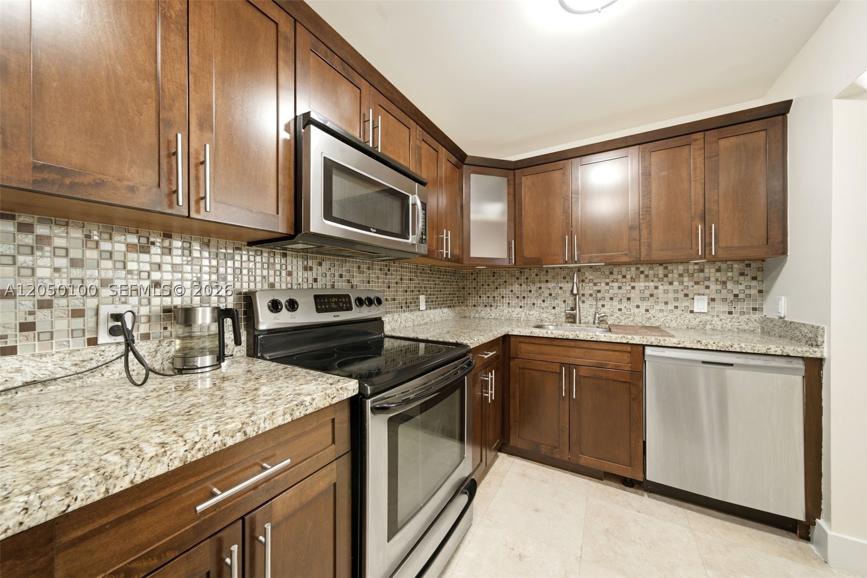 Large corner 3BR/2BA in a gated, secluded Aventura community. The owner has completed renovations, including an updated kitchen and new flooring, giving the home a fresh move-in-ready feel. Features an open kitchen, full dining room, spacious patio, and fenced outdoor space that truly makes it feel like you live in a house rather than a condo. Plenty of closet space, including an oversized pantry, plus a large eat-at island in the kitchen. Southview is tucked away from traffic, just 5 minutes to the beach or mall. Rare opportunity to own a 3-bedroom in Aventura at this price. Easy to show, Call Listing agent.