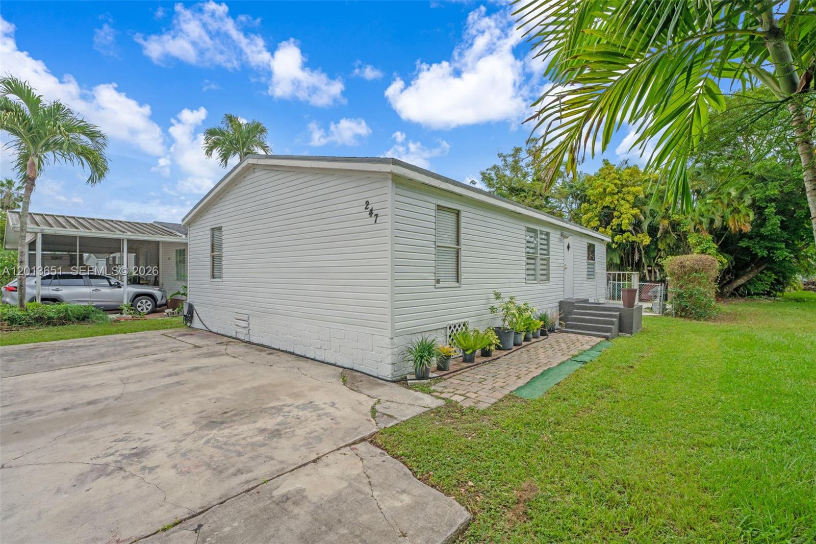 Beautifully remodeled 3-bedroom, 2-bathroom manufactured home located in the desirable Americana Village community — where you own the land! This corner-lot property offers added privacy and a spacious layout, featuring updated interiors, PVC plumbing, and a brand-new roof to be installed soon. Enjoy a large backyard with plenty of space for outdoor living, entertaining, or future customization. Americana Village is a well-maintained community offering convenience and value. Don’t miss this great opportunity to own both the home and the land in one of the area’s most sought-after manufactured home communities!