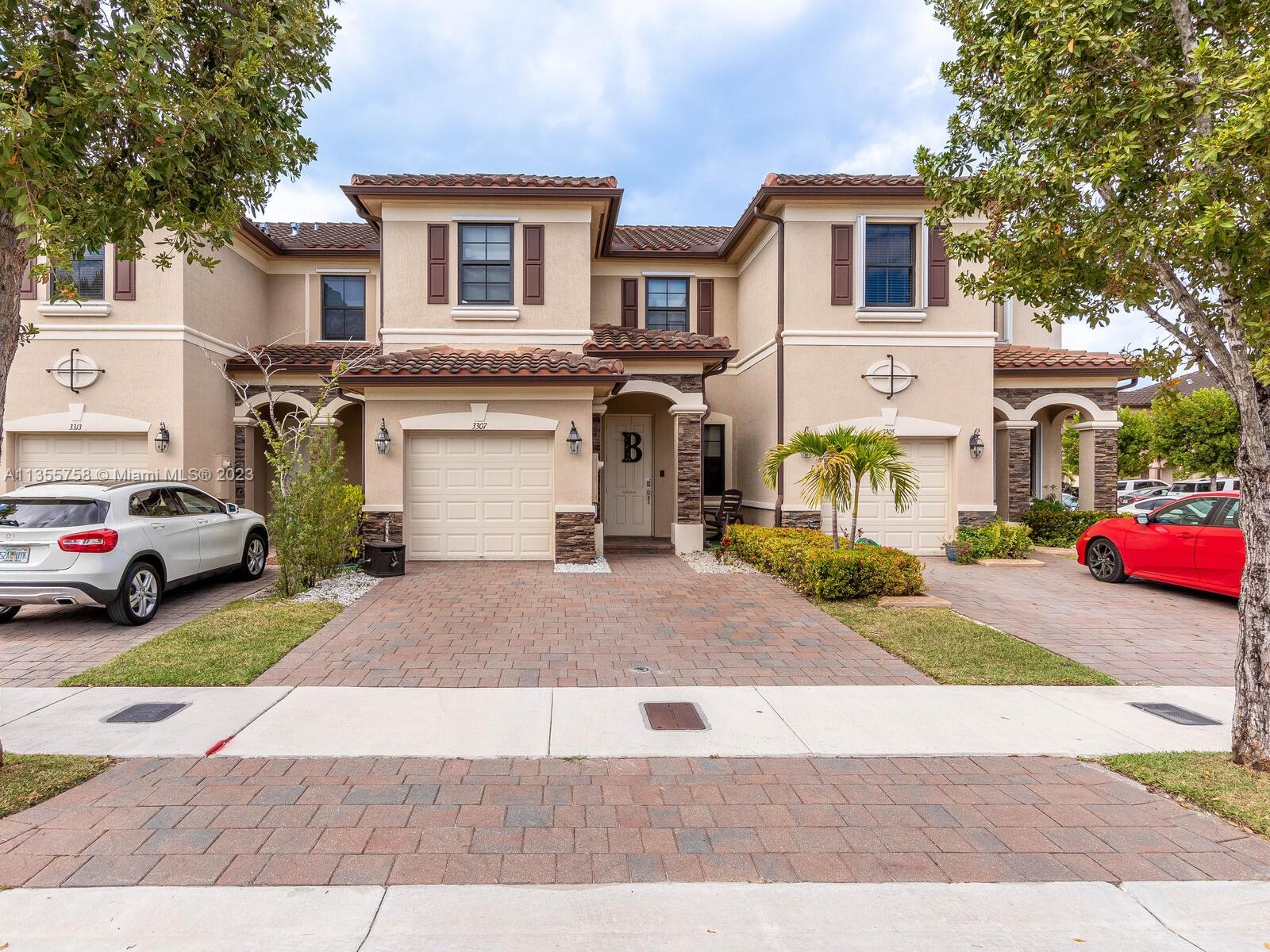 PRIME TOWNHOME IN ONE OF THE MOST DESIRABLE GATED COMMUNITIES IN HIALEAH GARDENS: This 3-bedroom, 2.5-bathroom townhouse features built-in California closets and a fenced backyard to enjoy with family and friends. Richly appointed spaces include large private patio, 1 car garage, laundry room located on the second floor for convenience. It includes impact windows, stainless steel appliances, tasteful shades, and alarm system. This home is perfect for a family! Resort-style community with pool, jacuzzi, playground, and fitness center. Just minutes from the Turnpike, Palmetto, I-75 expressway, Doral, etc.- Move in Ready!