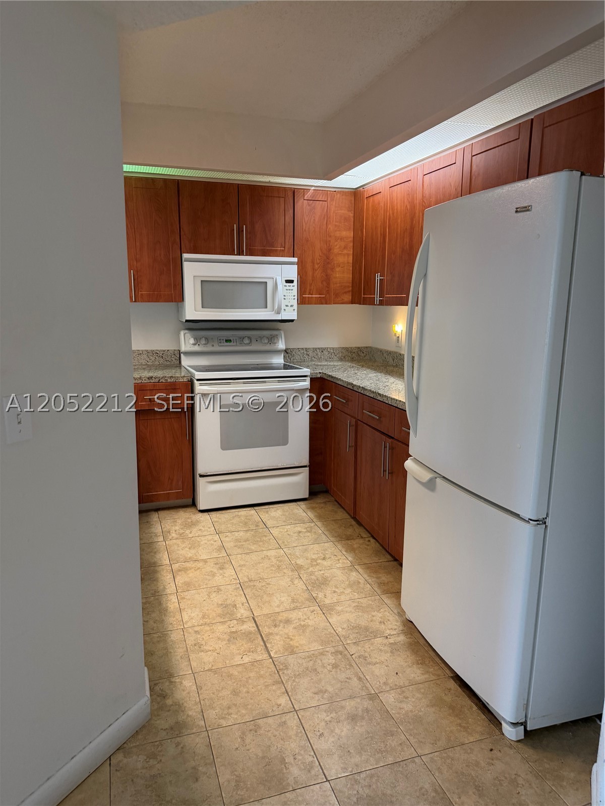 SMOVE IN SPECIAL JUST FIRST MONTH & SECURITY!!ELEVATOR, WASHER/DRYER IN UNIT, STORM SHUTTERS !!! THE WORKD!!! COMPLETELY REMODELED UNIT WITH BRAND NEW LAMINATE FLOORING AND AMAZINF LED LIGHTING EVERTWHERE - NEVER CHANGE A LIGHT BULB AGAIN!! THERES A GOURMET KITCHEN WITH WOOD RAINFALL CABINETRY, GRANITE COUNTERS AND GR3EAT APPLIANCES. DESIGNER BATHROOM LIGHTING, VANITIES AND SHOWER HEAD!! PRIVATE LOCATION ON THE GOLF COURSE AND LAKE. FAMOUS SENIOR RESORT STYLED COMMUNITY WITH 100.000 SF CLUBHOUSE, TONS OF CLUBS, COURTESY BUS, CABLE & INTERNET INCLUDED!!!