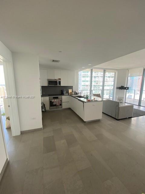 REACH CONDO - Residential Lease