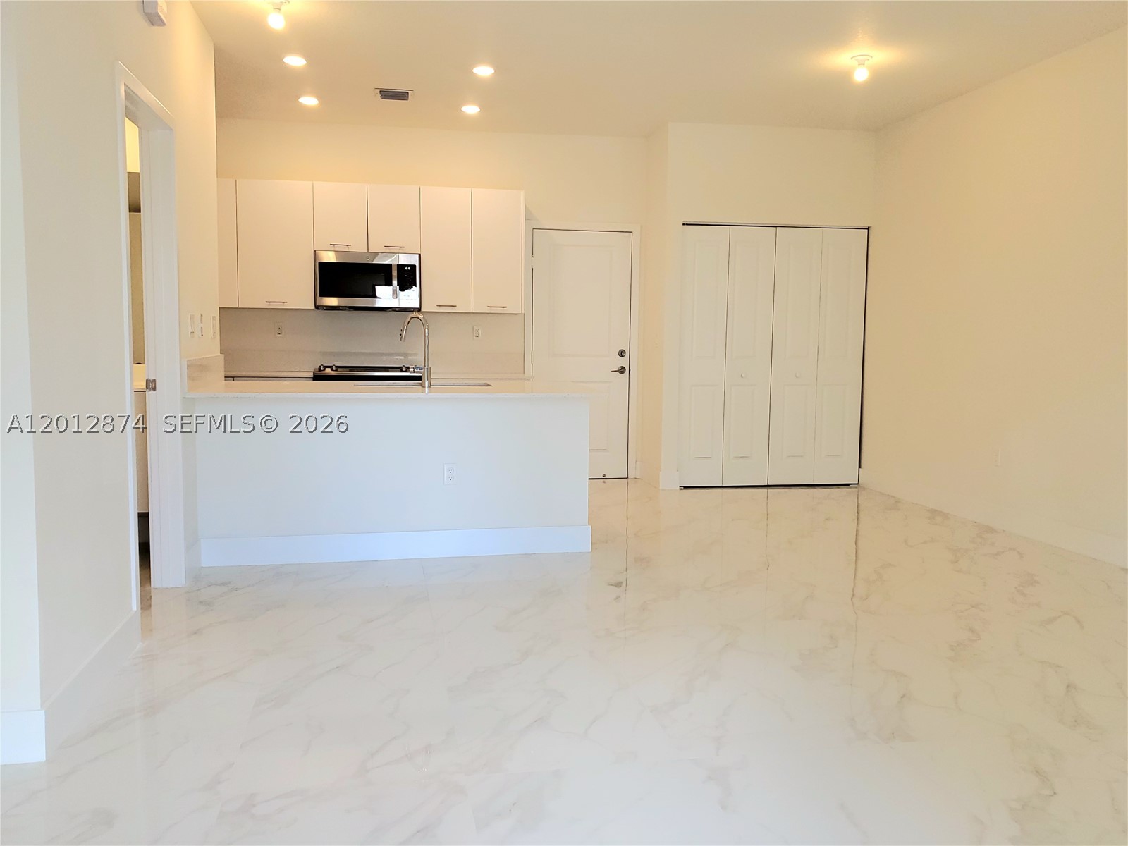 Stunning  2 story townhouse located in one of Miami’s fastest-growing areas, known for its modern lifestyle, top rated schools, and vibrant atmosphere.The property offers 1,431 sq ft of living space, featuring 3 spacious bedrooms and 2.5 bathrooms. The primary suite including a walk-in closet, high quality laminate wood flooring, and large windows that fill the space with natural light, along with a private balcony.The modern kitchen, designed for both functionality and style, is equipped with stainless steel appliances, elegant cabinetry, quartz countertops, and a convenient breakfast area.Additional features include a fully equipped laundry area and a 2 car garage. The home also incorporates smart technology, including a smart doorbell, lighting system, and smart locks, providing a secure and comfortable living environment.The community offers a resort style clubhouse with excellent amenities, perfect for enjoying a high-quality lifestyle.Ideally located near public transportation, restaurants, shopping centers, and major highways, offering easy access to everything Doral has to offer.