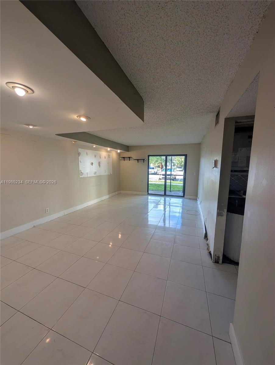 2/1 Handyman special. If you have the time and talent I don't you can make this a great home for a great price. Near everything, assigned parking,laundry room on each floor, additional storage compartment,community pool, clubhouse. Just needs some appliances, updating and TLC. Maintenance includes water and garbage. Can be rented.         NOT A 55+ COMMUNITY