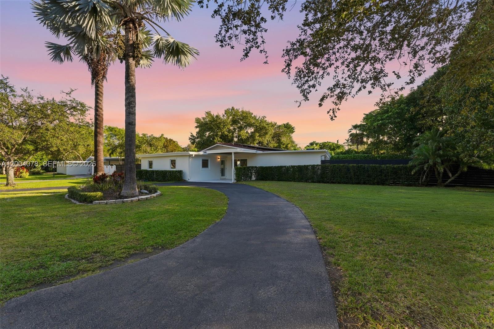Completely remodeled and truly move-in ready, this Pinecrest residence offers 3 bedrooms and 3 beautifully appointed bathrooms within 1,856 sq ft of refined living space. Thoughtfully updated throughout, the home features a stylish modern kitchen, tastefully renovated baths, and light-filled interiors that create an inviting and comfortable atmosphere. Equipped with solar panels and impact glass, the property offers both efficiency and peace of mind. Set on a 15,004 sq ft lot, the private backyard showcases a sparkling pool and ample space for outdoor enjoyment and entertaining. Ideally situated near top-rated schools, parks, and dining, this home presents an exceptional opportunity to enjoy both quality and location in a sought-after community.