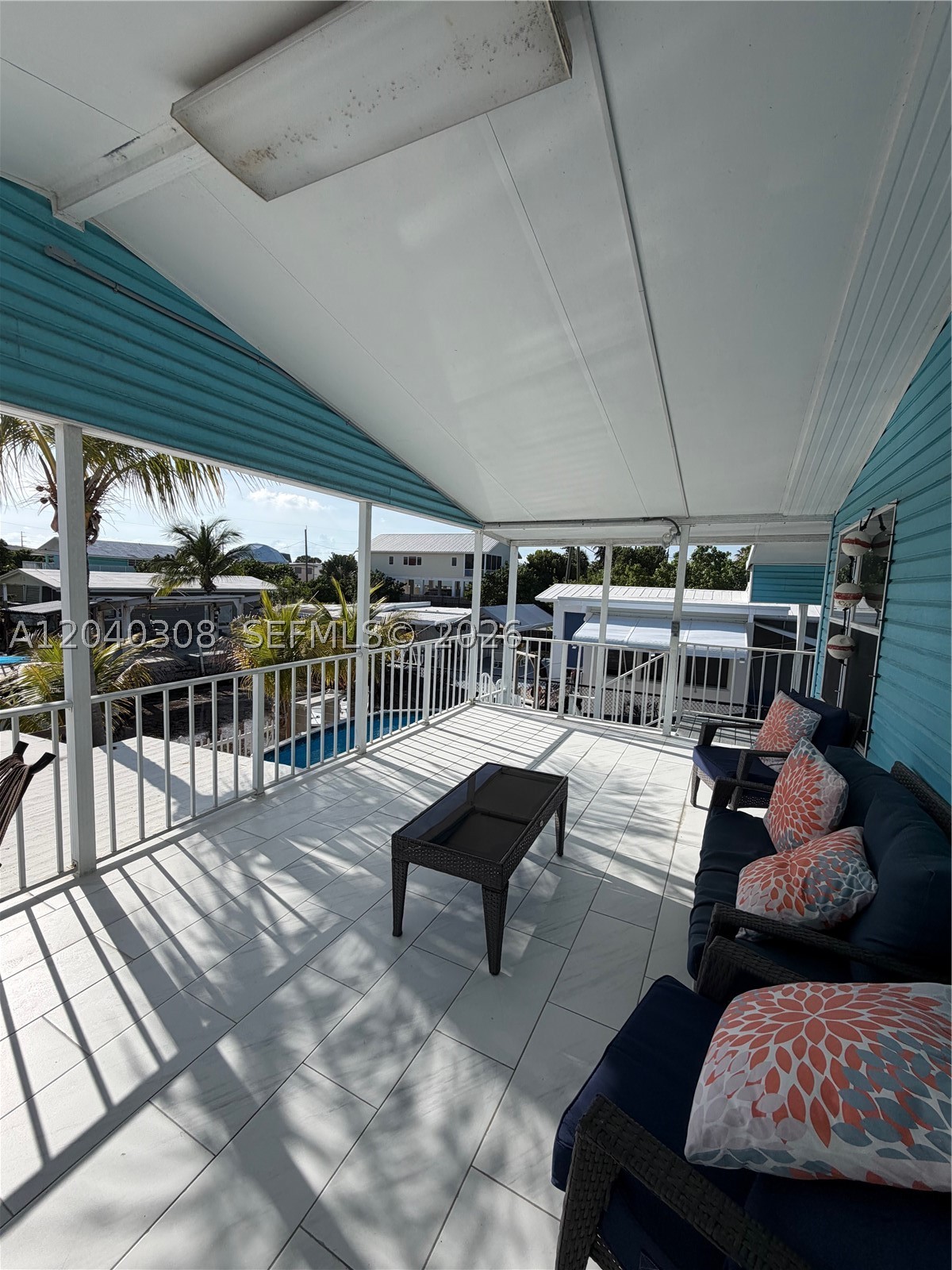 Welcome to your slice of paradise in the heart of Marathon! This beautifully updated canal-front retreat offers the ultimate Florida Keys lifestyle with direct boating access, private dockage, and a backyard designed for year-round enjoyment. Whether you’re seeking a full-time residence, vacation getaway, or income-producing investment, this property checks every box.

Inside, you’ll find a bright and inviting open-concept layout featuring updated flooring, a modern kitchen, stylish finishes, spacious bedrooms, and beautifully renovated baths. The coastal-inspired interior is move-in ready and perfectly complements the relaxed waterfront setting.

Step outside to your private tropical oasis complete with a sparkling above-ground pool, expansive entertaining areas, tiki-style bar, paver driveway, and approximately 50 feet of canal frontage. Boaters will appreciate the private dock, seawall, and quick access to open water for world-class fishing, diving, and island hopping.

Additional features include a metal roof, hurricane protection, ample parking, low-maintenance exterior, and exceptional outdoor living spaces designed to embrace the Keys lifestyle.

Ideally located near restaurants, marinas, shopping, beaches, and all that Marathon has to offer, this waterfront gem delivers the perfect blend of comfort, recreation, and island living. Don’t miss this rare opportunity to own a canal-front retreat in one of the Florida Keys’ most desirable boating communities.