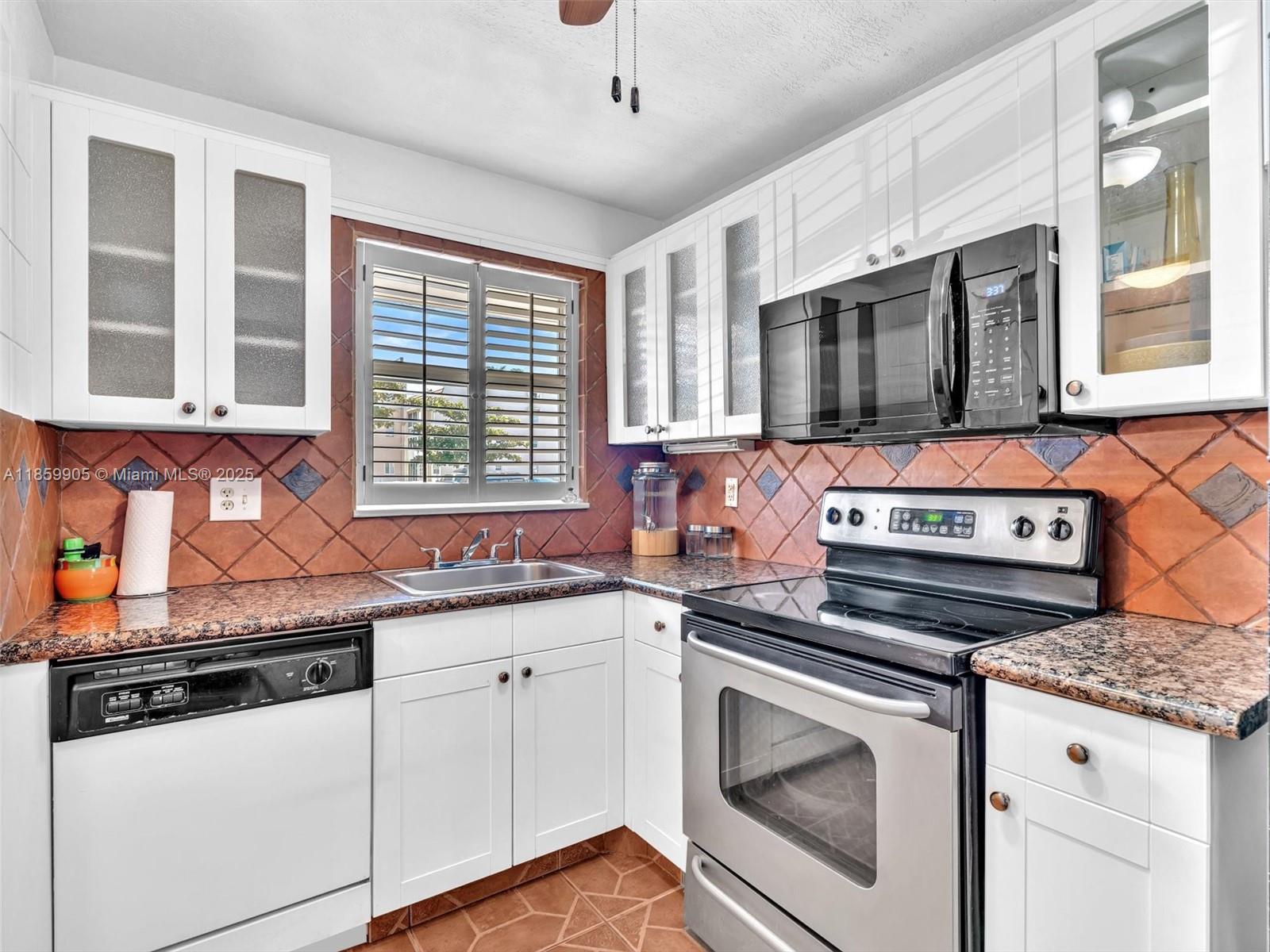 Spacious 2BR/2BA condo in the 55+ Sunrise Lakes community! 1st floor unit with impact windows & sliding glass door, tile floors throughout, and a large primary bedroom with walk-in closet. Enjoy serene garden & water views from the screened patio. Extra storage unit & 1 parking space included. Maintenance covers cable, water, sewer, trash, insurance, landscaping, pool, roof, pest control, and more. Resort-style amenities include clubhouse, pool, sauna, tennis, shuffleboard, billiards, gym, courtesy bus & more!