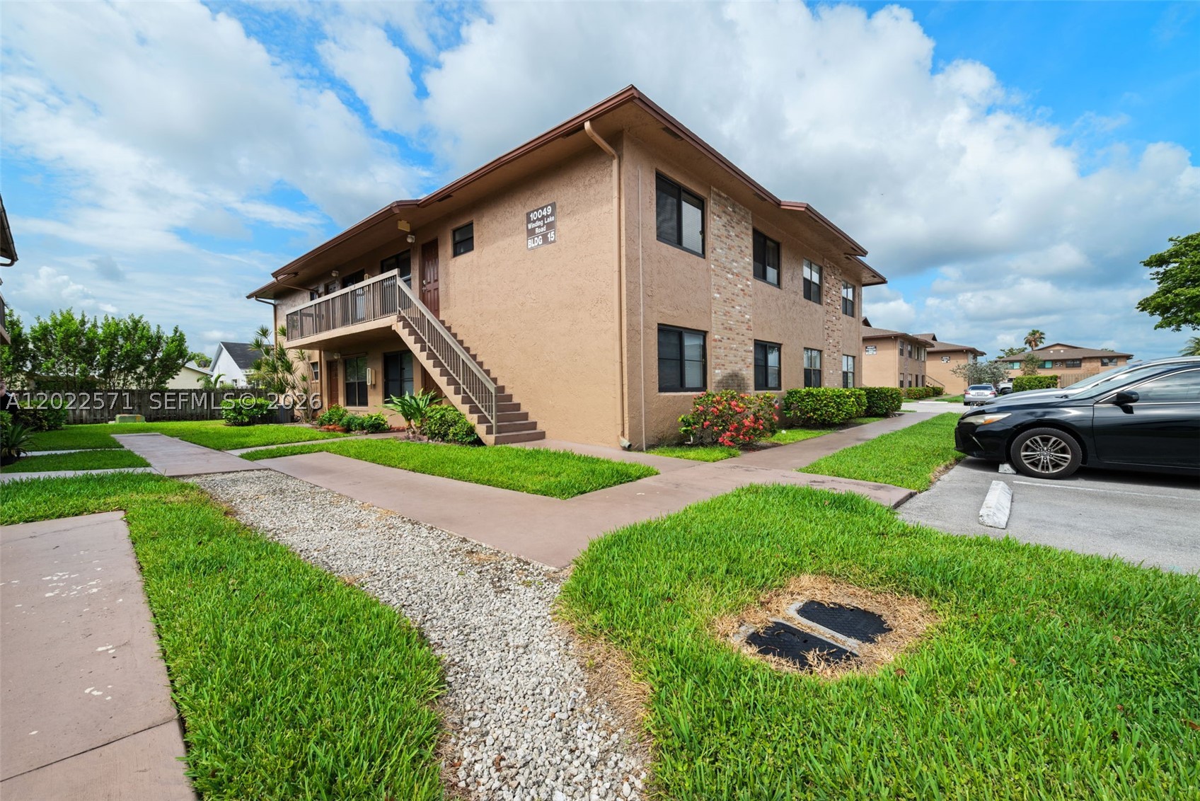 Welcome to this beautifully updated 2-bedroom, 2-bath residence offering the perfect blend of style, comfort, and convenience in the heart of Sunrise. Step inside to discover an open and inviting layout featuring rich wood flooring, a modern kitchen with sleek white cabinetry, granite countertops, stainless steel appliances, and the convenience of an in-unit washer and dryer. Both bathrooms have been tastefully renovated, while the spacious primary suite provides a relaxing retreat. Enjoy peaceful community living with well-maintained grounds and easy access to shopping, dining, parks, and entertainment. Ideally located just minutes from Sawgrass Mills Mall, Amerant Bank Arena, major highways, and everyday conveniences, this home is perfect for homeowners and investors alike. Move-in ready and beautifully maintained—don’t miss the opportunity to make this exceptional property yours!
