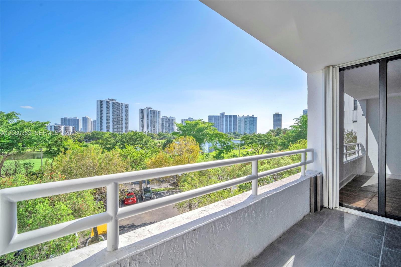 Beautifully updated and move-in ready residence featuring expansive golf course and skyline views from a spacious private balcony. This bright and airy unit offers wood flooring throughout, a modern kitchen with stainless steel appliances, quartz countertops and custom wood cabinetry, along with tastefully renovated bathrooms. The open layout and floor-to-ceiling sliding glass doors fill the home with natural light while creating a seamless indoor-outdoor living experience. Enjoy resort-style amenities including pool, tennis courts, fitness center, 24-hour security and ample guest parking. Ideally located just minutes from Aventura Mall, restaurants, parks and the beaches.

?
