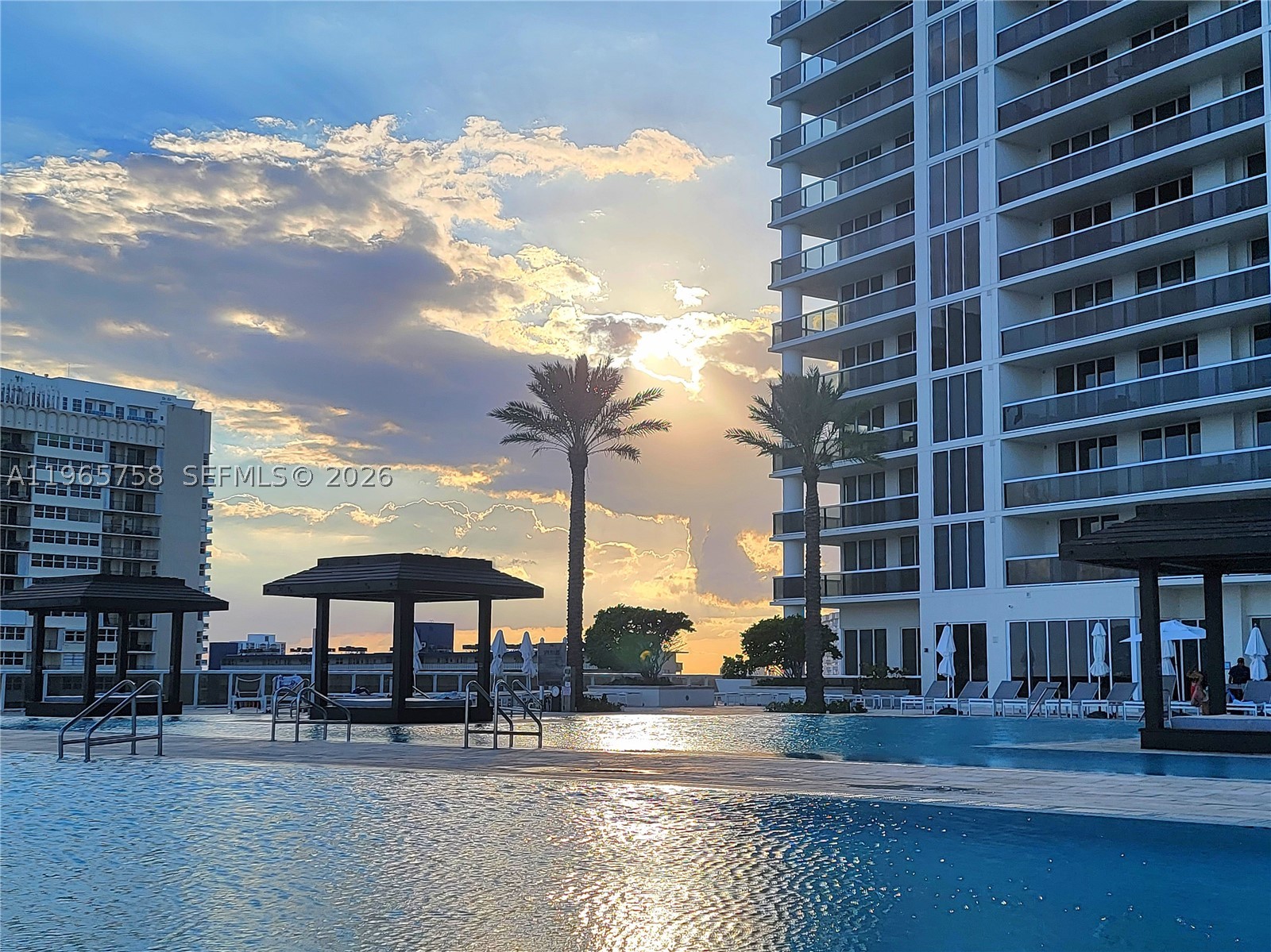 PRICE REDUCTION!  DON'T MISS YOUR CHANCE TO OWN ONE OF THE FINEST OEANFRONT RESIDENCES ~ LUXURY OCEANFRONT LIVING AT IT'S FINEST! ~ CALL TODAY! ~ 1 Bedroom, w Den and Full Bathroom has Floor to Ceiling Sliding Glass Doors in the Bedroom and Living Room Letting in Plenty of Natural Light. You will Feel Pampered as you Treat Yourself to a Soothing Soak in the Jetted Spa Tub- Shower Combination.  On The Balcony you'll see the Most Awesome Sunsets Unfolds Before You! - The Condo has A Washer/Dryer, Storage and Under Building Assigned Parking.   Fantastic Community Amenities Include Private Beach Access, 5 Heated Pools, Pool Drink and Snack Bar, Fitness Centers, Sauna, Cold Plunge Pool and So Much More!  Schedule A Massage and other Services at the Private Residents Only Spa....It's All Here!  The Location Without Saying Is the Best ~ Close to Everything Between Fort Lauderdale and Miami.