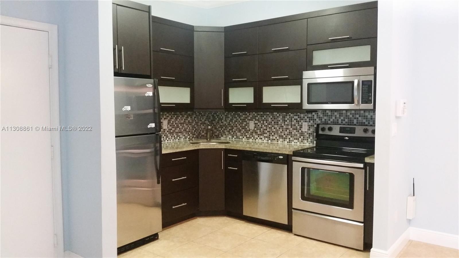 TAMARAC GARDENS CONDOMINI - Residential Lease