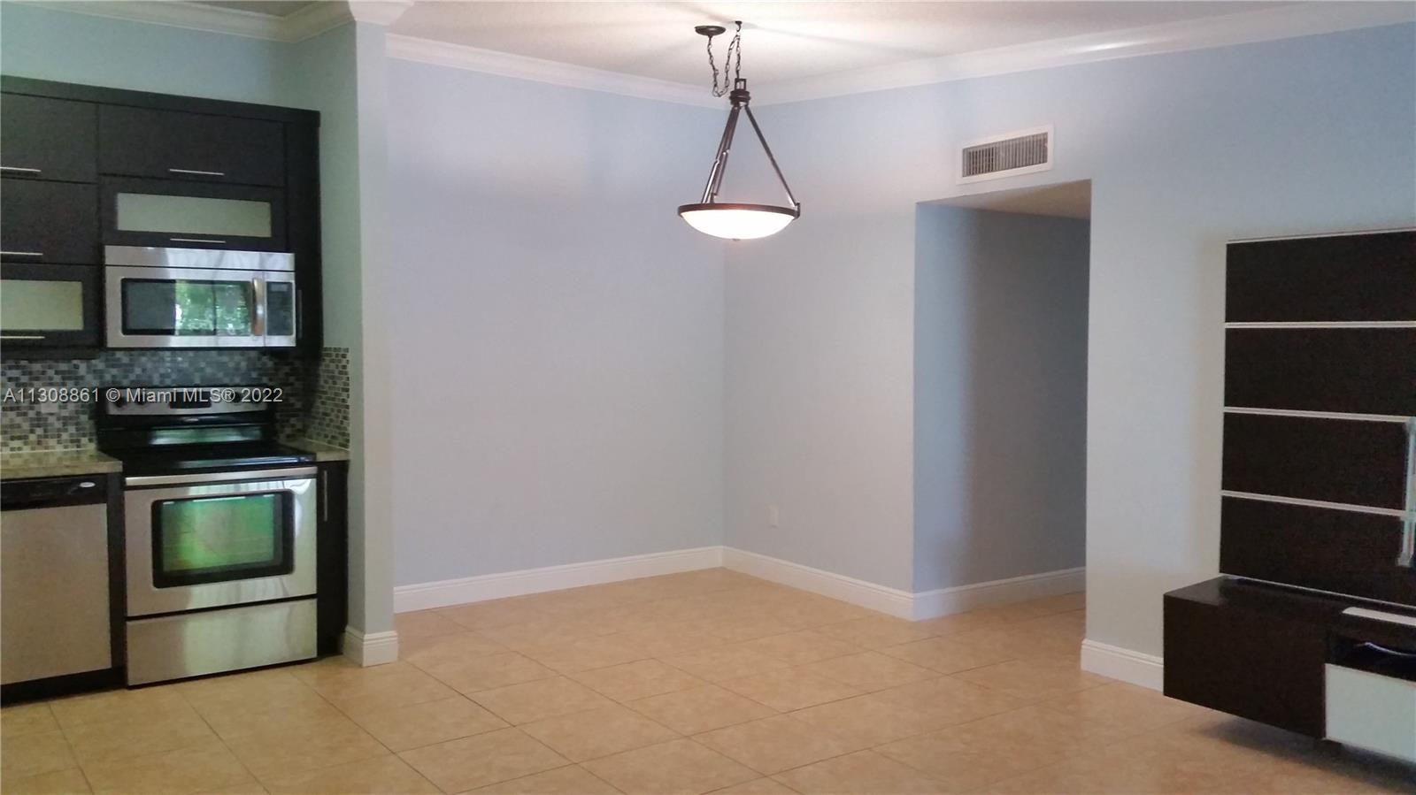 TAMARAC GARDENS CONDOMINI - Residential Lease