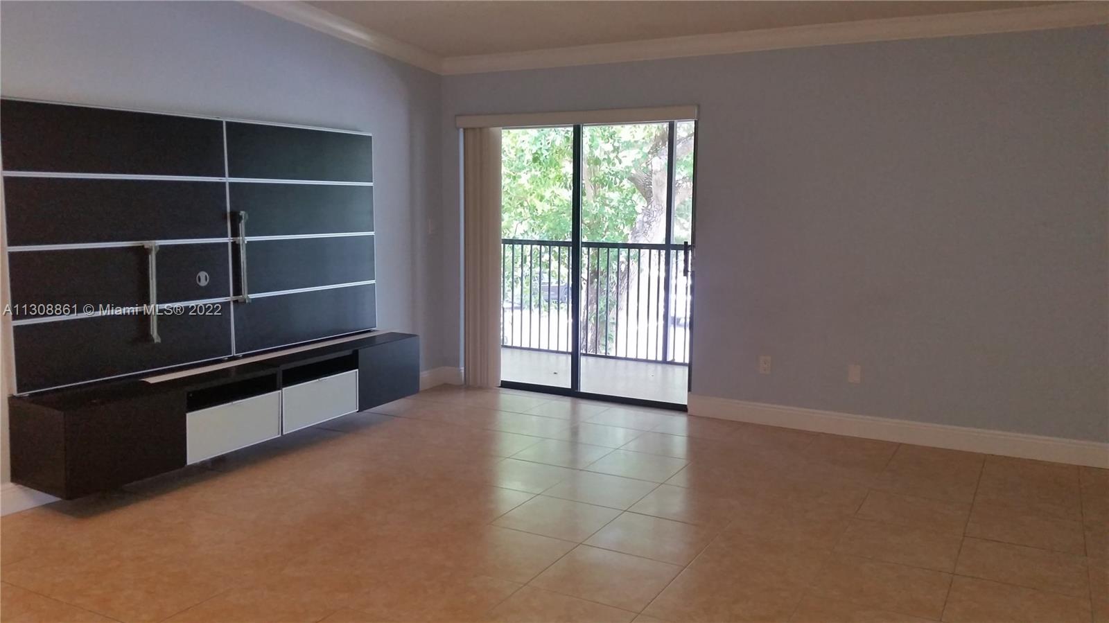 TAMARAC GARDENS CONDOMINI - Residential Lease