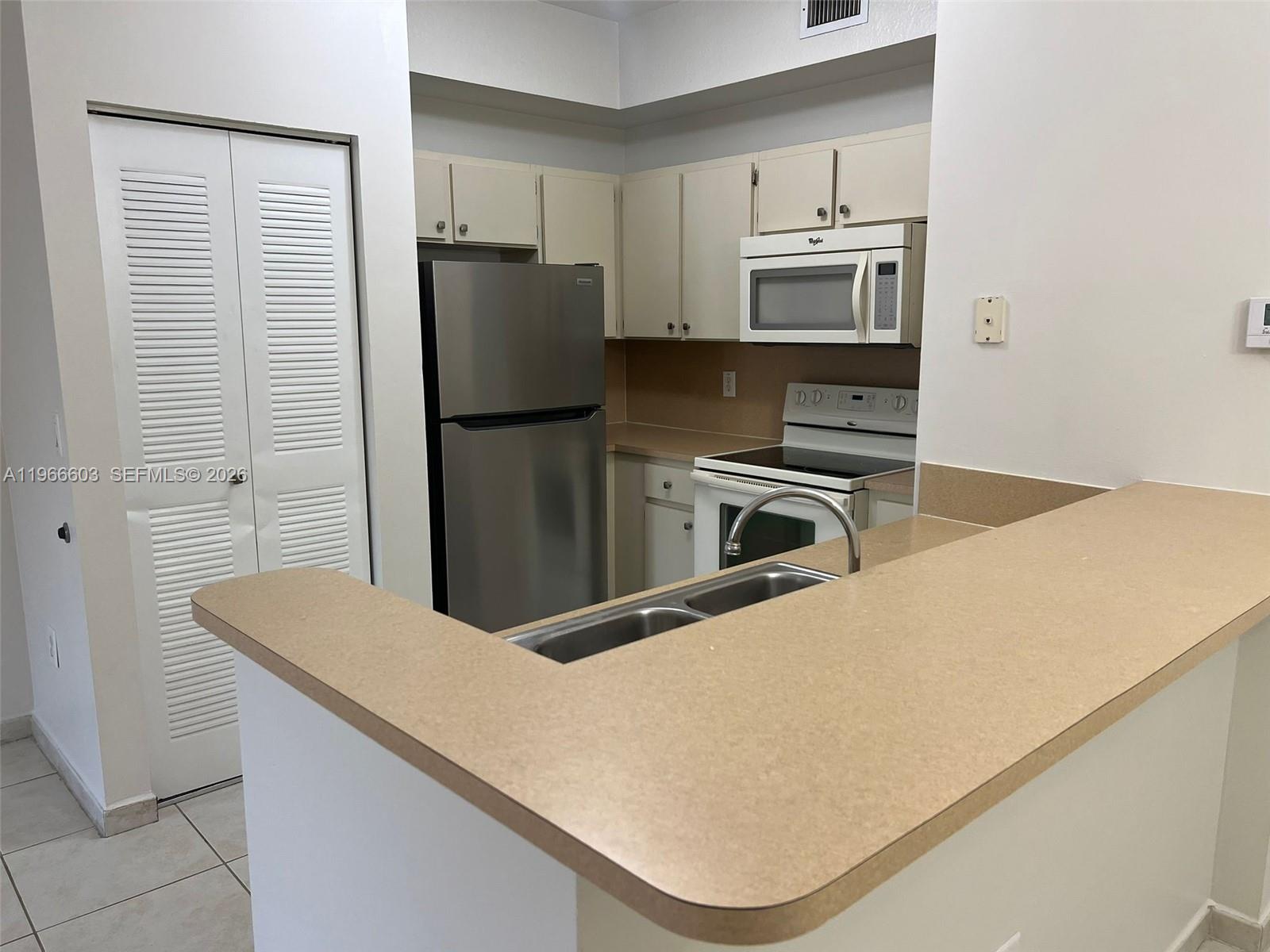 Beautiful 2-bedroom, 2-bathroom corner unit located on the third floor, offering added privacy and natural light. This well-maintained property features stainless steel appliances, a private balcony perfect for relaxing, and a comfortable layout ideal for modern living. Excellent investment opportunity, the property is currently rented at $2,450 per month through October 14, 2026, providing immediate and stable rental income. Don’t miss this great opportunity!