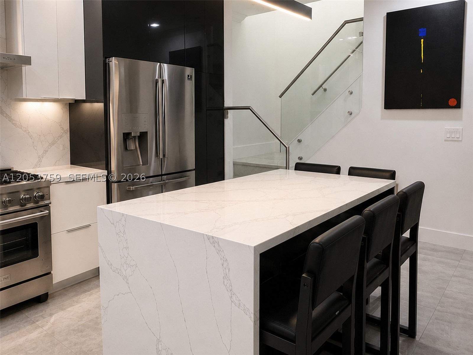 Fully remodeled luxury townhome in the sought-after guard-gated ARTESIA Community of Sunrise. Bright, modern & move-in ready, this exceptional residence combines sophisticated design, smart home connectivity & resort style living. The Open living area flows into a gourmet kitchen featuring white cabinetry, premium stainless-steel appliances, abundant storage & oversized stone waterfall island perfect for entertaining. The home offers 3 spacious bedrooms, 3 full bathrooms, & a space that can also be used as media room or quiet home office. All bedrooms feature custom closets & a spa-inspired bath featuring a custom glass-enclosed shower. Exceptional built-in Storage laundry area with full-size washer & dryer, 2 refrigerators, 2-car parking, plus pre-wired ethernet ports in every room & private ubiquity network infrastructure with dedicated switchboard for outstanding whole home connectivity. This unique residence features one room on the first floor & two on the second floor. Additionally, there is a discreet hidden built in safe, providing additional secure storage for valuables, plus in home TESLA electric charging port station for added convenience. Enjoy resort-style living in Artesia with heated pools, cabanas, spa, jacuzzi, gym, indoor basketball, tennis, pickleball, massage parlor, billiards, business center. Minutes from Sawgrass Mills, Amerant Arena, Weston, the new "Baptist Hospital Health Mega Center" across the street & major highways. It Won't Last