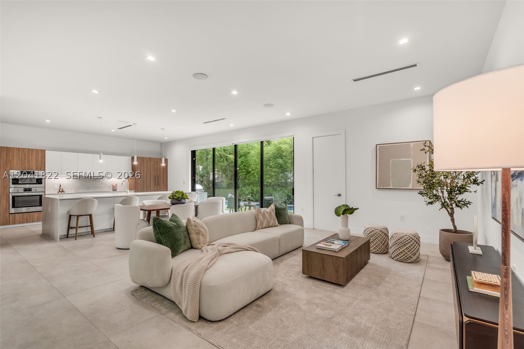 Beautifully designed modern residence situated on a desirable corner lot in New Shenandoah. This elegant home offers 4 bedrooms, plus a dedicated office-a den/flex space, and 5 full bathrooms. The interior showcases exquisite Pedini Italian cabinetry in the kitchen and bathrooms, custom-built closets, and a stunning solid wood floating staircase. Soaring ceilings and an open-concept layout create bright, sophisticated living spaces filled with natural light.

Designed for both comfort and entertaining, the property features a private pool, summer kitchen, and a one-car garage. Additional highlights include two A/C units, two tankless water heaters, an oversized laundry room, and thoughtfully designed living spaces throughout. Ideally located near Brickell, Coconut Grove, Coral Gables, and Downtown Miami, this exceptional residence seamlessly combines modern elegance, functionality, and convenience. Schedule your private showing today.
