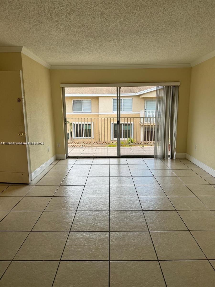 Freshly painted! Large and spacious unit at Doral Gardens! Large social area plus master bedroom with walking closet. Doral Gardens is a gated community in the Downtown Doral Area. Close to everything!! Steps away from Downtown Doral dining and entertainment venues, access to Doral's A+ schools. Minutes from all major highways! This unit will not last, bring your clients today Easy to Show!!!