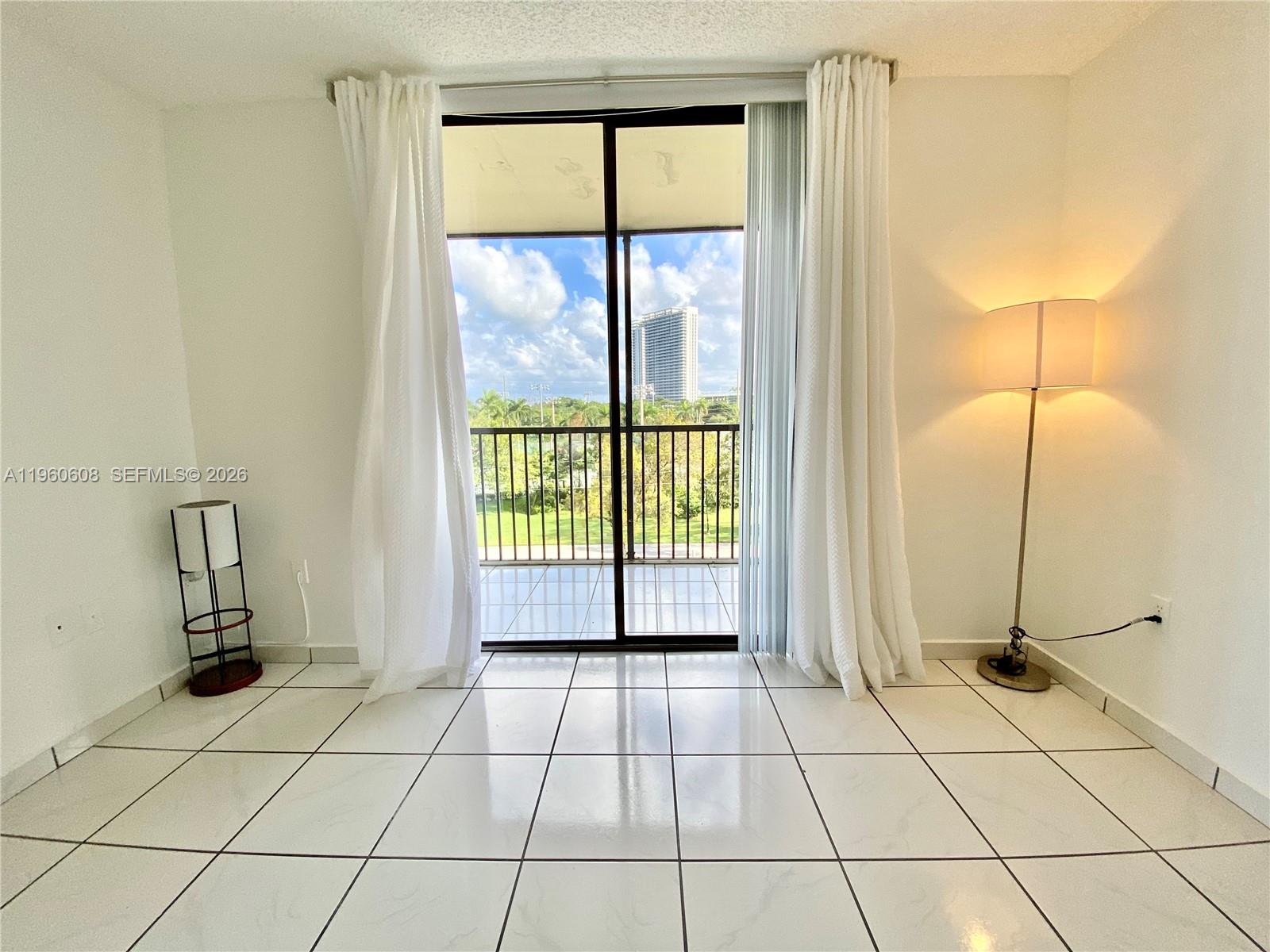 Great for investors!!!  The unit is rented for one year lease starting June 1, 2026 at a rate of $1,550 per month. this light delightful 1bed/1bath unit in a serene, sought-after neighborhood. Brand new ipmact windows and doors, screened balcony, walk-in closet, tile throughout. Gated community is approximately 200 yards across for the historic Ancient Spanish Monastery and a few blocks away from Greynold's Park, which offers nature trails, a fun-filled playground for the kids, fishing out of a rock quarry, picnicking, bird-watching, and the Greynolds Golf Course. Close to FIU, AVENTURA MAL AND BEACHES. Ideal for those who value both peace and proximity, this location also places you less than 10 minutes from the beach. Investor-friendly, with the flexibility to rent out , this property offers the best of both worlds—whether you're looking for a relaxing retreat or a well-connected investment. Don't miss that opportunity!