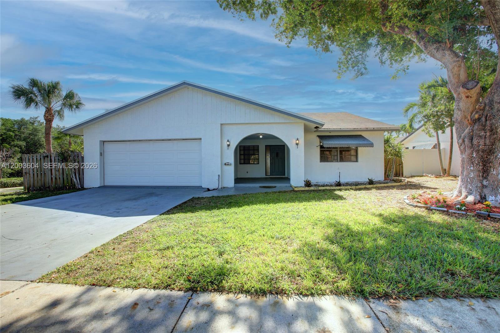 Beautiful 4-bedroom, 2-bath corner home featuring a spacious layout and a large screened-in patio, perfect for relaxing or entertaining. The bright living room flows into a designated dining area, while the kitchen features granite countertops, newer appliances, and a 2025 AC unit. The home offers modern-style bathrooms, tile flooring throughout the main living areas, and wood flooring in the bedrooms. One bedroom includes a private entrance, ideal for guests..  Enjoy a fenced backyard with ample space for boat or truck storage, plus a 2-car garage and additional parking. Ideally located just minutes from the beach, Fort Lauderdale–Hollywood International Airport, Seminole Hard Rock Hotel & Casino, US-1, I-595, and Dania Pointe. Jai Lai Casino, Joe Demaggion Memorial Hospitals. Also Available for Rent May 1, 2026