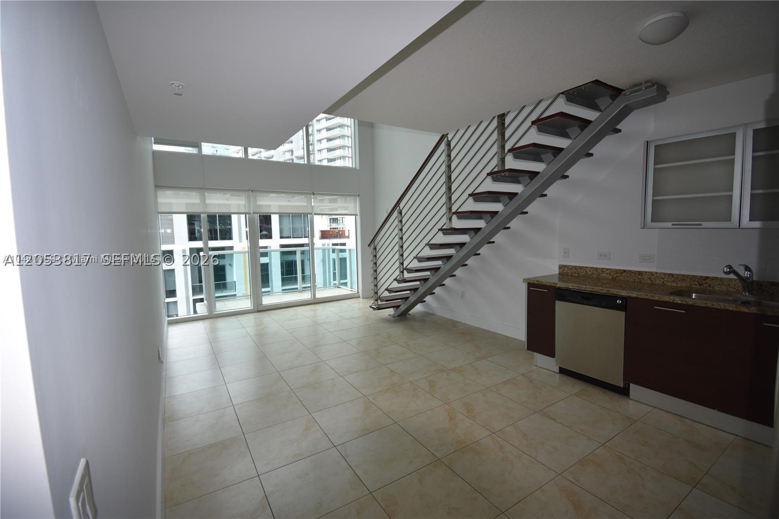 Modern two-story loft unit facing South. This spacious Loft include floor to ceiling impact windows with sliding door and double height ceilings. Bedroom and master bathroom located upstairs, half bathroom located in first floor, stainless steel appliances, granite countertops. Discover a one-of-a kind open floor plan offering panoramic views of Brickell City Center and skyline. State of the art amenities, 2 pools, fitness center, club rooms, riverwalk area. 24-hour concierge, assigned parking space. Great location, walking distance of Brickell City Centre, banks, restaurants, metro mover and shops. ***Available August 15/2026***