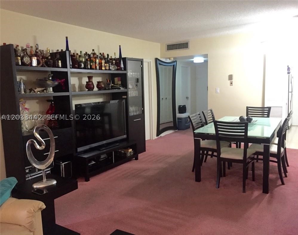THE CARRIAGE HOUSE CONDO - Residential