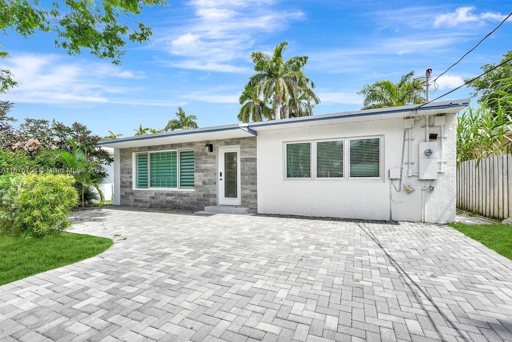 Hollywood Lakes Retreat: Go into this fully renovated 3-bedroom, 2-bathroom haven, filled with natural light and elegant finishes. The open floor plan is perfect for entertaining, while impact windows and doors provide peace of mind. A versatile en suite bedroom offers a serene primary suite. Enjoy the vibrant neighborhood, close to waterfront dining, pristine beaches, and convenient amenities.  This home offers effortless elegance, comfort, and the ultimate South Florida lifestyle.Ready for you to move in!