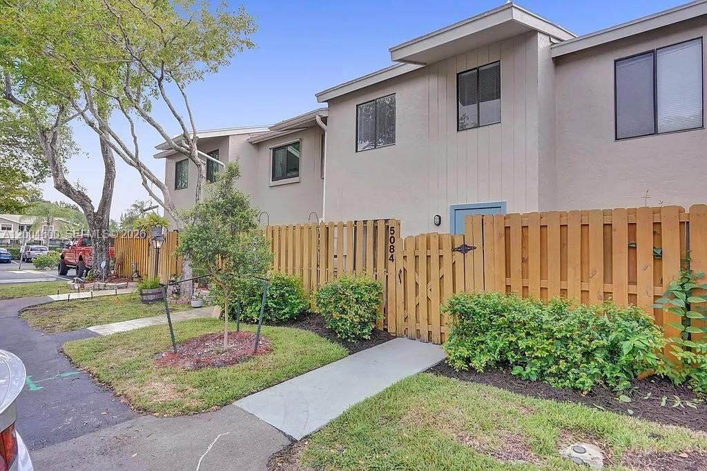 Rare opportunity in the sought after gated Saddle Up community in the heart of Davie. This fully updated 2 bedroom, 2.5 bathroom home offers over 1,300 square feet of living space and features a 2019 roof, new stainless steel appliances, new flooring, fresh interior paint, and updated kitchen and bathrooms with new lighting throughout. Enjoy added privacy with a fenced front courtyard and a covered patio overlooking a newly landscaped backyard with a large shed and rear gate opening to lake views, offering space for your ideal outdoor setting.
Located just a short walk to the pool and clubhouse, the community offers gated security, pool, clubhouse, dog park, racquetball courts, and storage for boats, trailers, and RVs as available, along with optional barn stall rentals. Conveniently located near all NSU schools, major roadways, shopping, dining, and more.