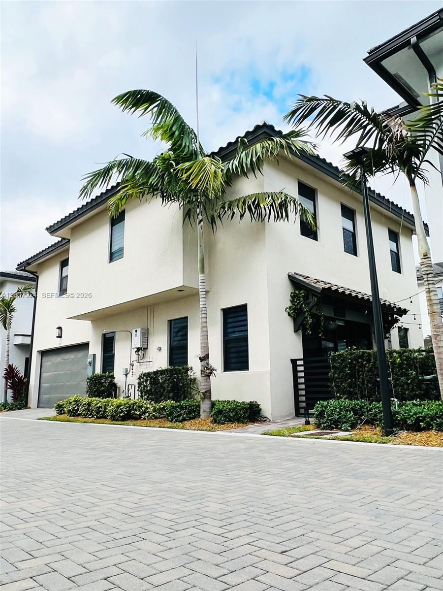 Welcome to this ELEGANT AND INVITING single-family home in the PRESTIGIOUS CANARIAS COMMUNITY at Downtown Doral. This BEAUTIFULLY DESIGNED 3-bedroom, 3.5-bath residence with 2-car garage offers UPSCALE FINISHES, an OPEN-CONCEPT LAYOUT, PREMIUM APPLIANCES, and SPACIOUS ENSUITE BEDROOMS, creating a WARM AND SOPHISTICATED place to call home. Enjoy a VIBRANT WALKABLE LIFESTYLE near parks, dining, shopping, TOP-RATED SCHOOLS, RESORT-STYLE AMENITIES, and Trump National Doral Miami just across the street. LUXURY, COMFORT, AND LOCATION ALL IN ONE.