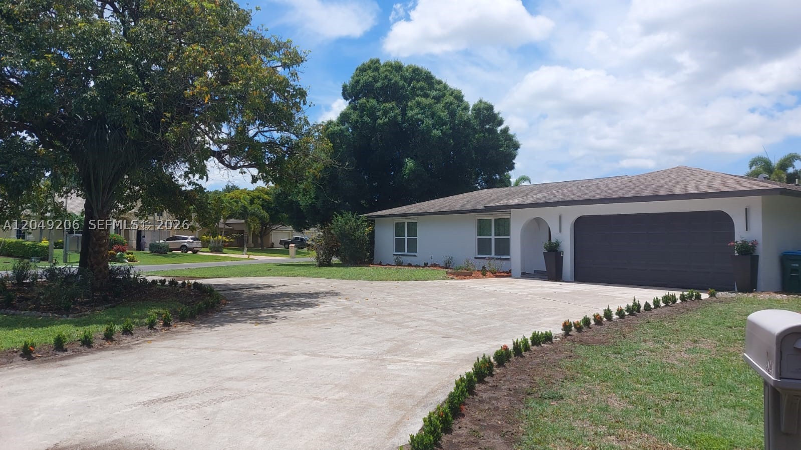 Experience Florida living at its finest in this beautifully modern home situated on a desirable corner lot with peaceful canal views. Designed for both comfort and entertaining, this property features a spacious screened-in pool, an expansive backyard with plenty of room for outdoor activities, and multiple areas to relax and enjoy the waterfront setting. Inside, you'll find a bright, open layout with contemporary finishes, creating a stylish and move-in-ready living space. The prime location offers convenient access to shopping, dining, schools, parks, and major roadways while providing the tranquility of a waterfront neighborhood. Whether you're looking for a full-time residence, seasonal retreat, or investment opportunity, this exceptional home offers the perfect combination of modern updates, outdoor living, and scenic canal views.