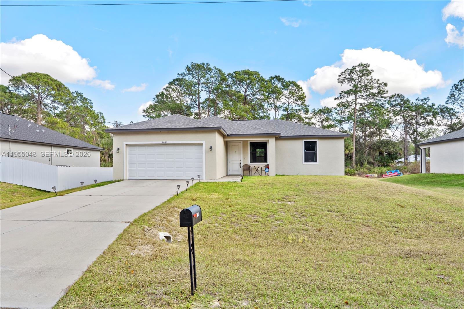 Seller is offering incentives!

This beautiful 3-bedroom, 2-bathroom home, built in 2022, is located in the growing community of LaBelle, Florida, and sits on a spacious ¼-acre lot with a 2-car garage. Designed with comfort and style in mind, the property features an open-concept kitchen with elegant high-gloss white cabinetry, stainless steel appliances, and granite countertops, seamlessly flowing into the main living areas. The home offers waterproof laminate flooring throughout, thoughtfully selected to complement the granite surfaces and neutral wall colors. Both bathrooms are fully tiled and feature modern vanities with granite countertops and refined finishes. High ceilings throughout the property enhance the sense of space and natural light, while impact-resistant windows and doors provide added security and energy efficiency. As a newer construction, this home offers long-life systems and the benefit of more affordable property insurance. Additional features include a complete ADT security system with cameras and door and window alarms, washer and dryer, and partial furnishings, including a living room set, dining table, sofa, and more—all included in the sale. This move-in-ready home combines modern design, quality construction, and valuable upgrades, making it an excellent opportunity for homeowners or investors alike.