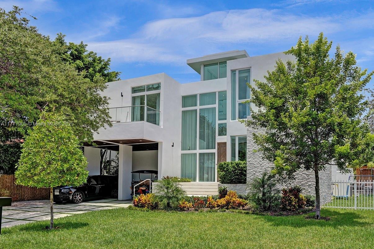 Luxurious coastal living in the exclusive island community of Key Biscayne, Miami. Designed by renowned architect José Sanchez, this 2020 home boasts a sleek architectural design, double height ceilings, floor-to-ceiling windows and abundance of natural light. High-end finishes and materials: marble floors, Italian cabinetry, and a gourmet kitchen with top-of-the-line Sub-Zero/Wolf appliances. Exterior features perfect for entertaining: spacious outdoor terrace, outdoor kitchen, newly refinished infinity pool and deck, new front door. A rooftop terrace to enjoy stunning sunset views. Five oversized bedrooms, en suite baths, walk-in closets and balconies. Close to the yacht club, pristine beaches, marinas, world-class golf course, shops and dining.
