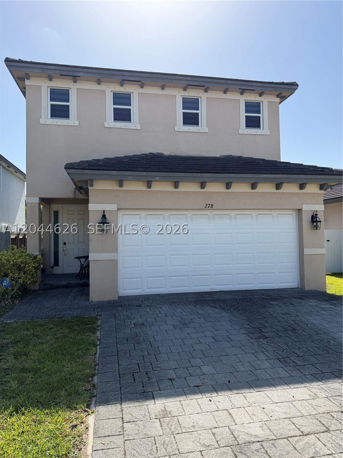 Welcome to this beautifully maintained 4-bedroom, 2.5-bath home with a 2-car garage, located in the highly sought-after Leeward II at Isles at Oasis community in Homestead. This spacious residence features an open-concept floor plan filled with natural light, a well-appointed kitchen with ample cabinet and counter space, and spacious living and dining areas perfect for everyday living and entertaining. Enjoy the elegance and convenience of zebra blinds throughout, including electric zebra blinds on the main level. Upstairs, the oversized primary suite offers a walk-in closet and a luxurious en-suite bathroom with dual vanities, a soaking tub, and a separate shower. Step outside to a spacious backyard with endless possibilities for entertaining, relaxing, or creating your own outdoor retreat. Ideally located just minutes from shopping, dining, top-rated schools, parks, major highways, and the Florida Keys. Residents also enjoy access to the Isles at Oasis clubhouse with resort-style amenities, making this move-in-ready home an exceptional opportunity. Schedule your private showing today!