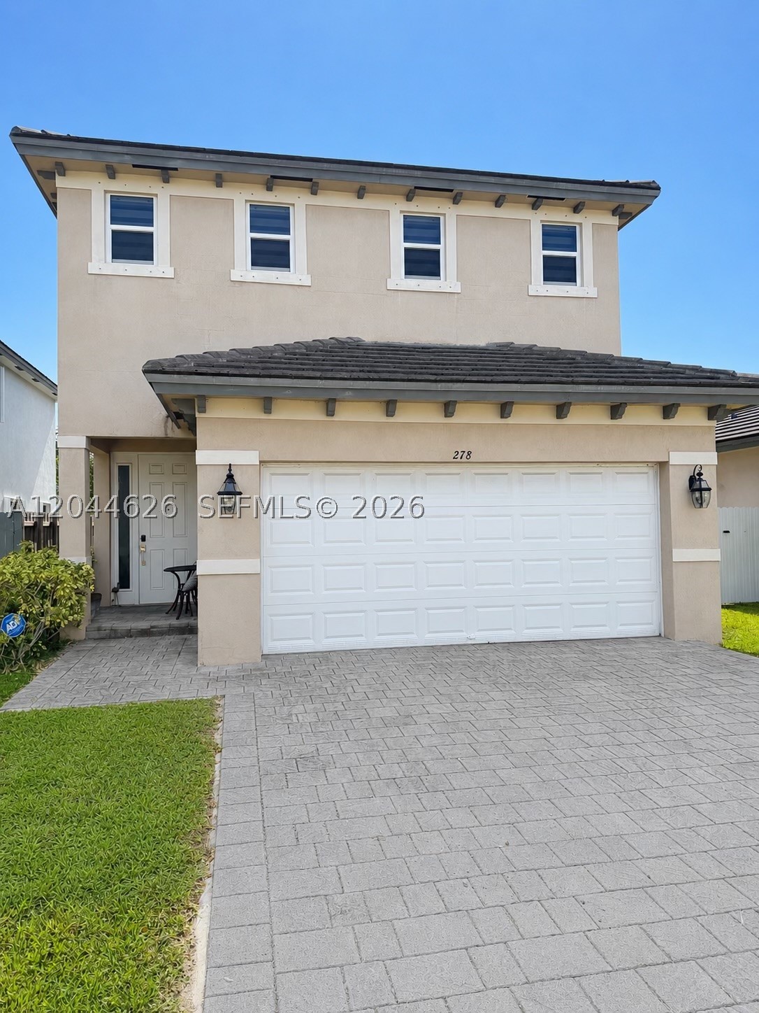 Welcome to this beautifully maintained 4-bedroom, 2.5-bath home with a 2-car garage, located in the highly sought-after Leeward II at Isles at Oasis community in Homestead. This spacious residence sits on a 5,181 Sq Ft Lot and features an open-concept floor plan filled with natural light, a well-appointed kitchen with ample cabinet and counter space, and spacious living and dining areas perfect for everyday living and entertaining. Enjoy the elegance and convenience of zebra blinds throughout, including electric zebra blinds on the main level. Upstairs, the oversized primary suite offers a walk-in closet and a luxurious en-suite bathroom with dual vanities, a soaking tub, and a separate shower. Step outside to a spacious backyard with endless possibilities for entertaining, relaxing, or creating your own outdoor retreat. Ideally located just minutes from shopping, dining, top-rated schools, parks, major highways, and the Florida Keys. Residents also enjoy access to the Isles at Oasis clubhouse with resort-style amenities, making this move-in-ready home an exceptional opportunity. Schedule your private showing today!